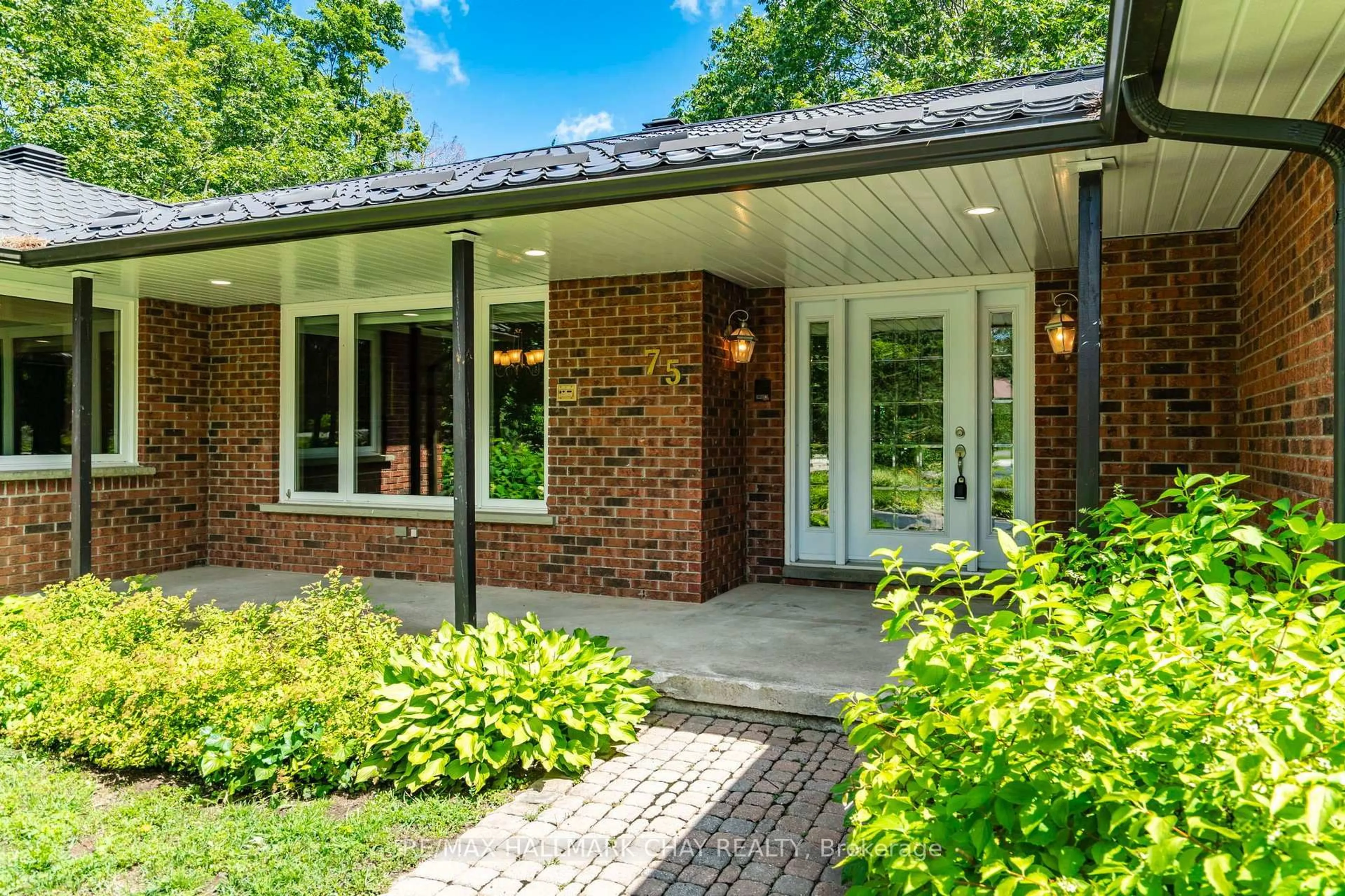 Home with brick exterior material, street for 75 Cathedral Pines Rd, Oro-Medonte Ontario L4M 4Y8