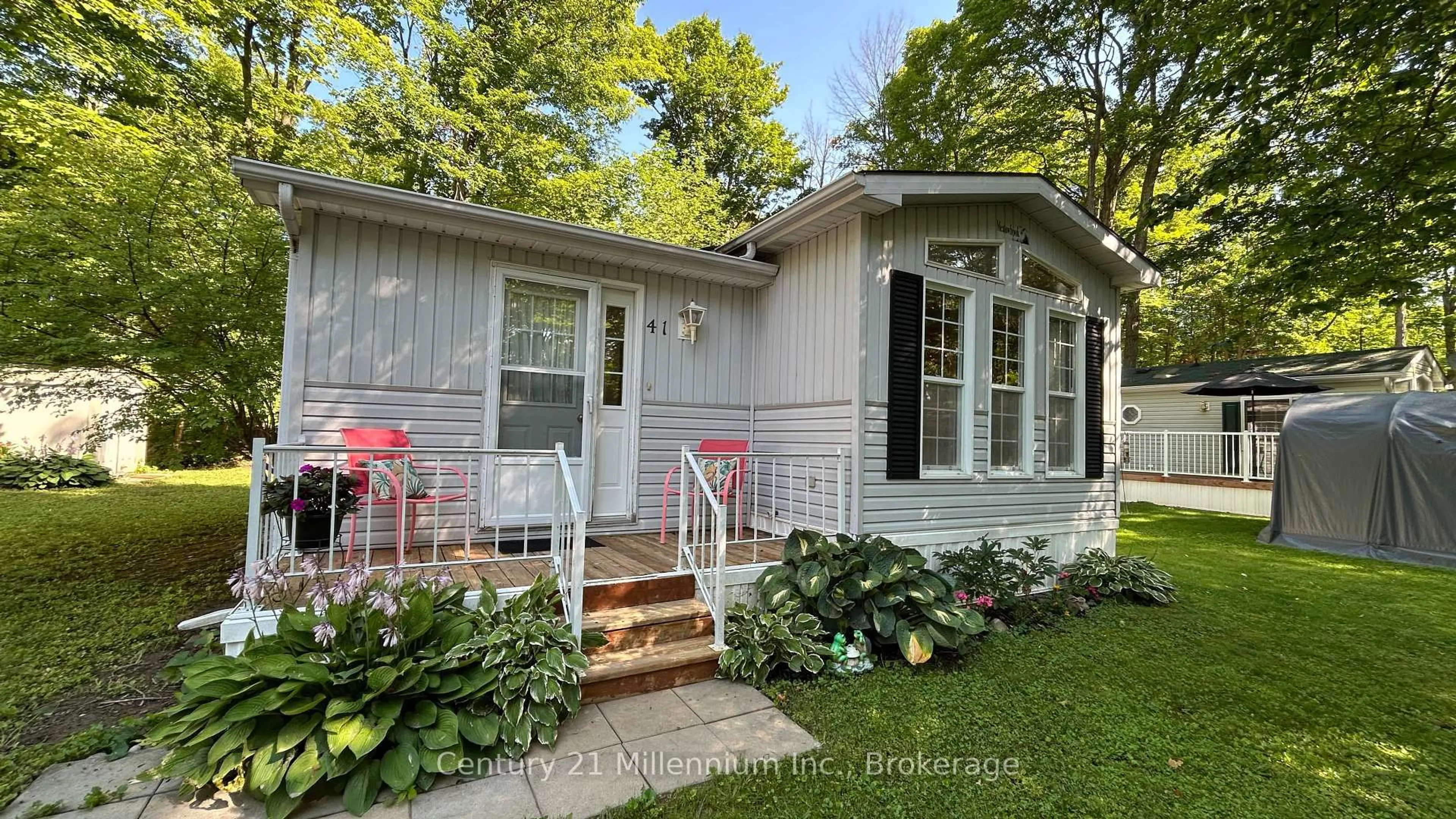 Home with vinyl exterior material, street for 41 The Boardwalk, Wasaga Beach Ontario L9Z 3A8