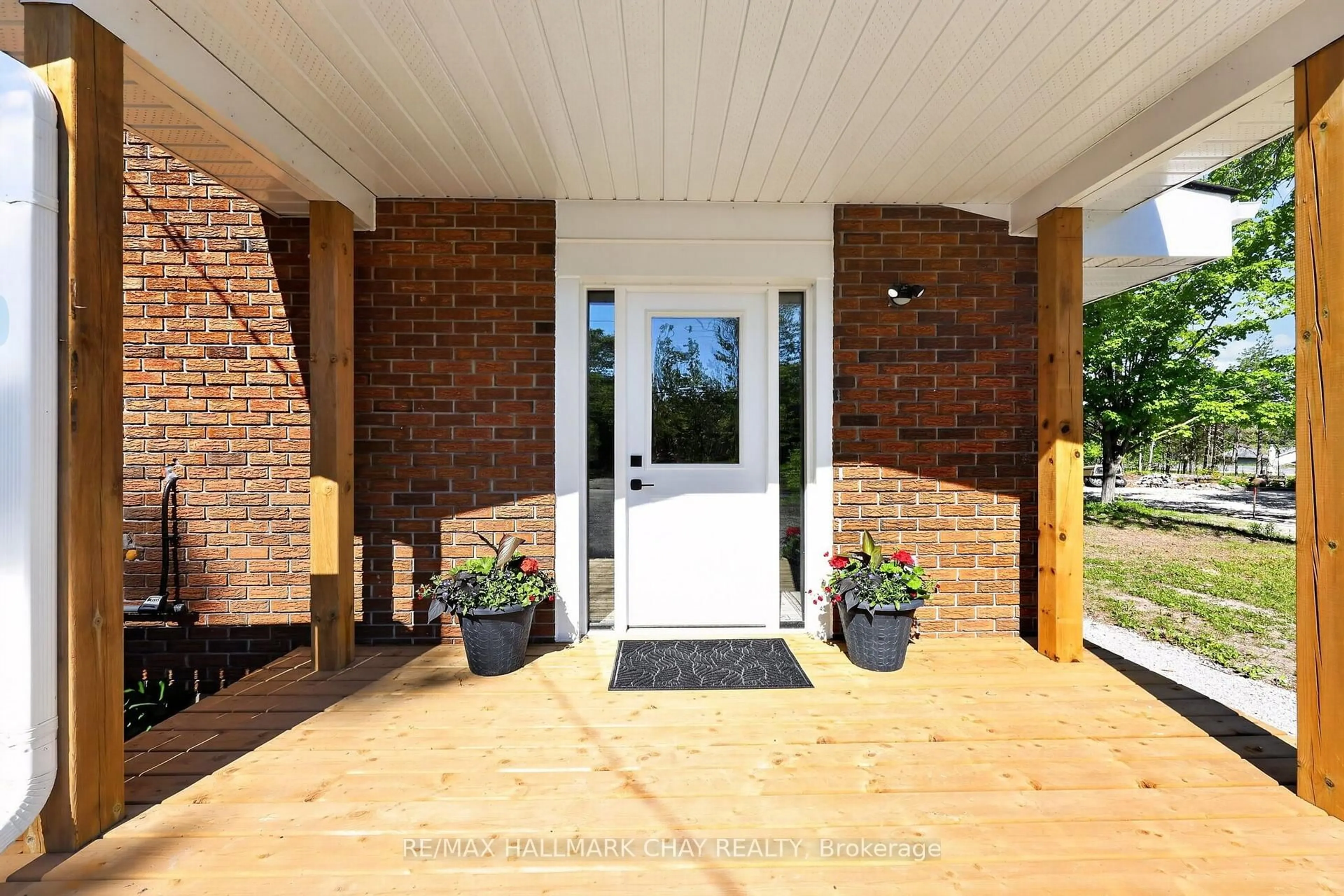 Home with brick exterior material, street for 8717 Beachwood Rd, Wasaga Beach Ontario L9Z 2G5