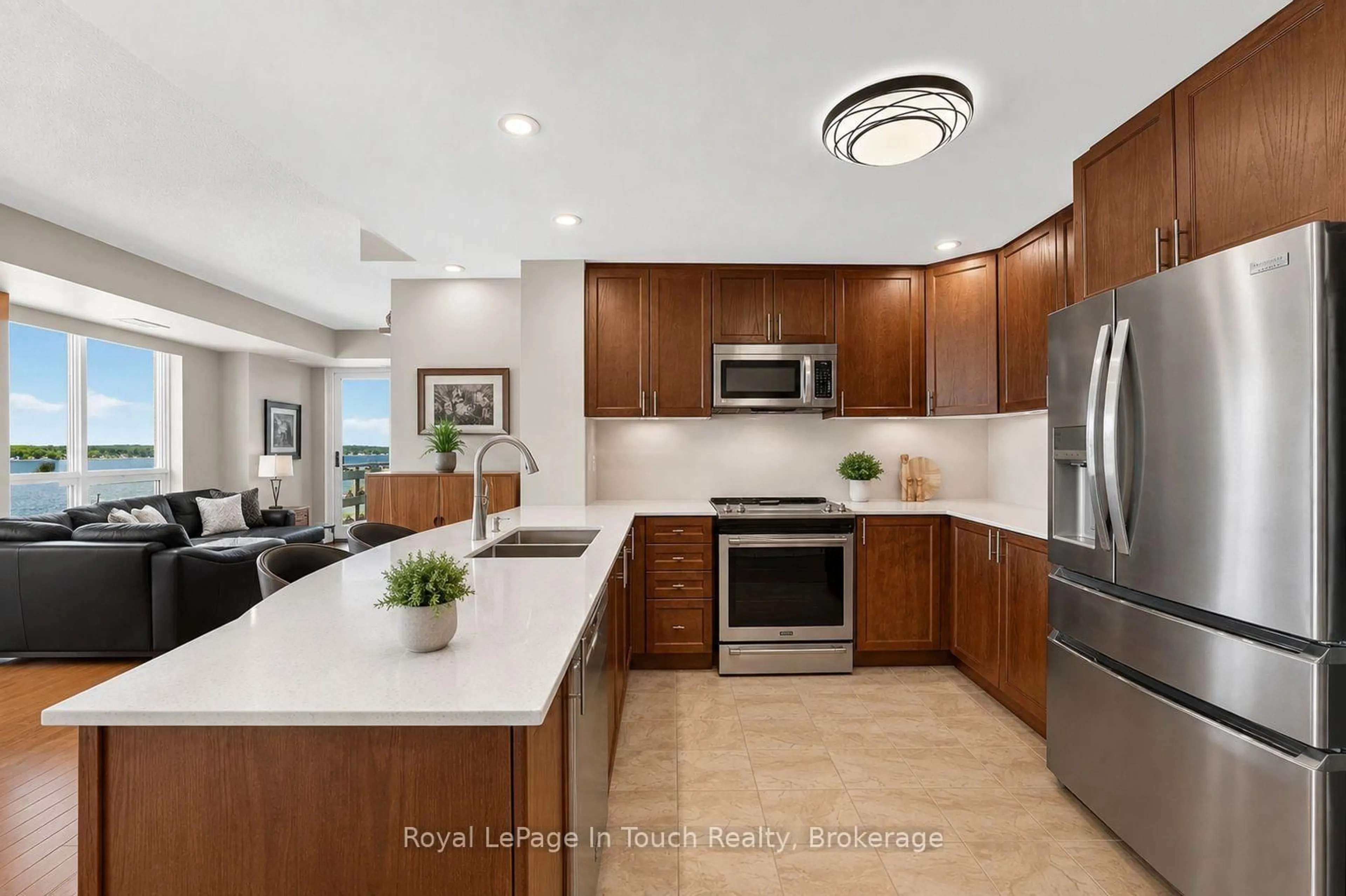 Open concept kitchen, ceramic/tile floor for 699 Aberdeen Blvd #501, Midland Ontario L4R 5P2