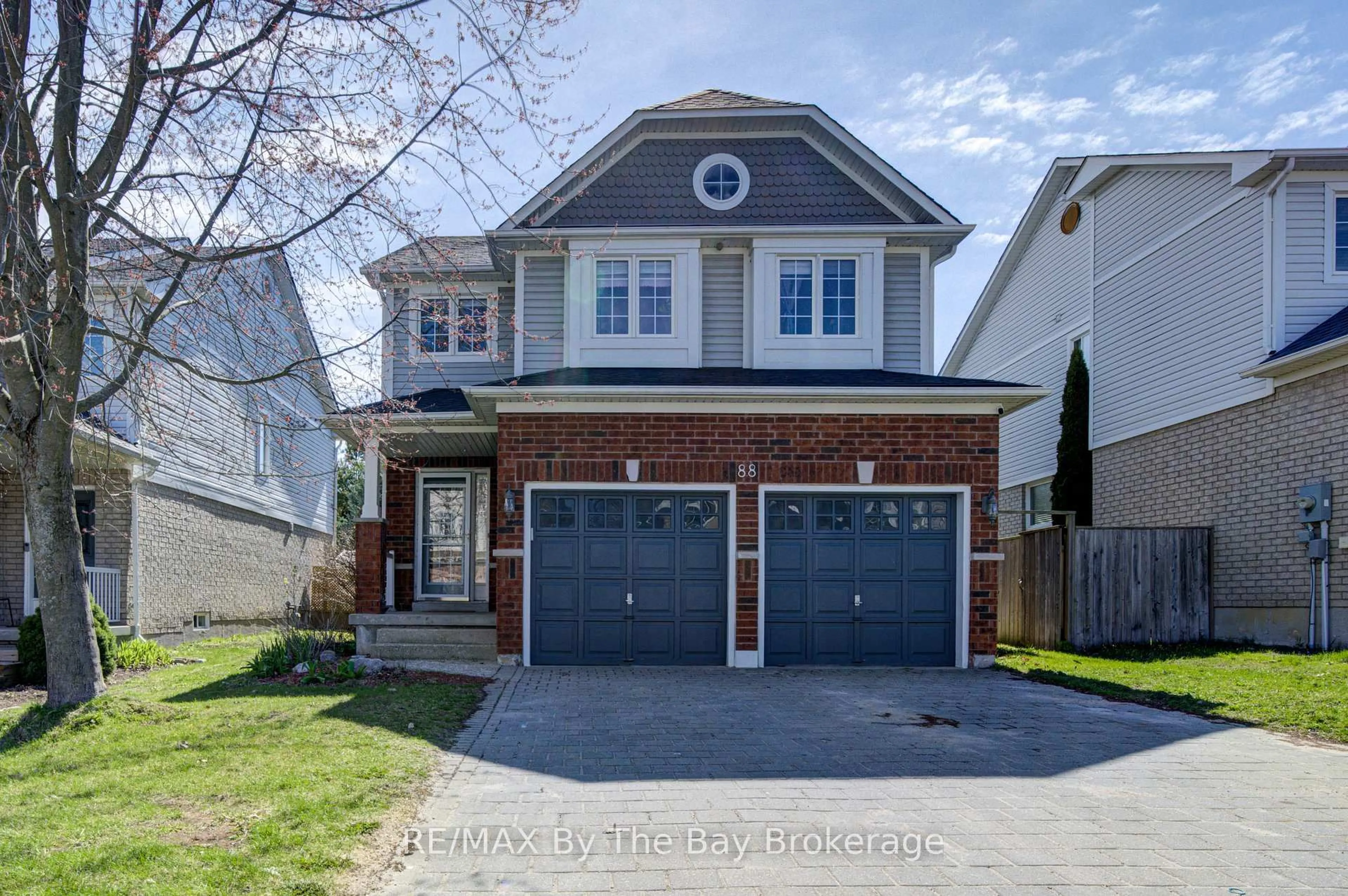 Home with brick exterior material, street for 88 Wesley Ave, Wasaga Beach Ontario L9Z 0B9