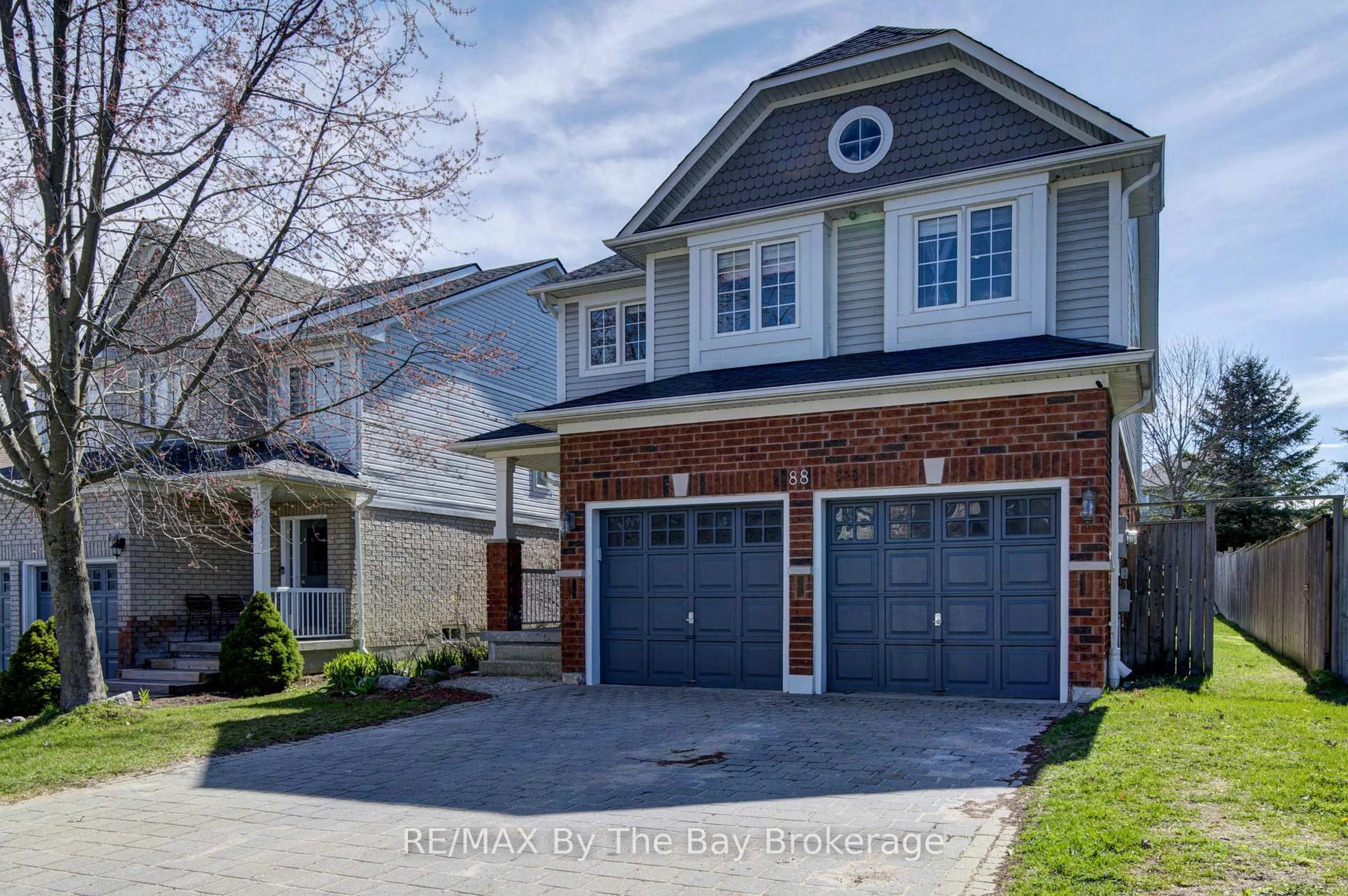 Home with brick exterior material, street for 88 Wesley Ave, Wasaga Beach Ontario L9Z 0B9