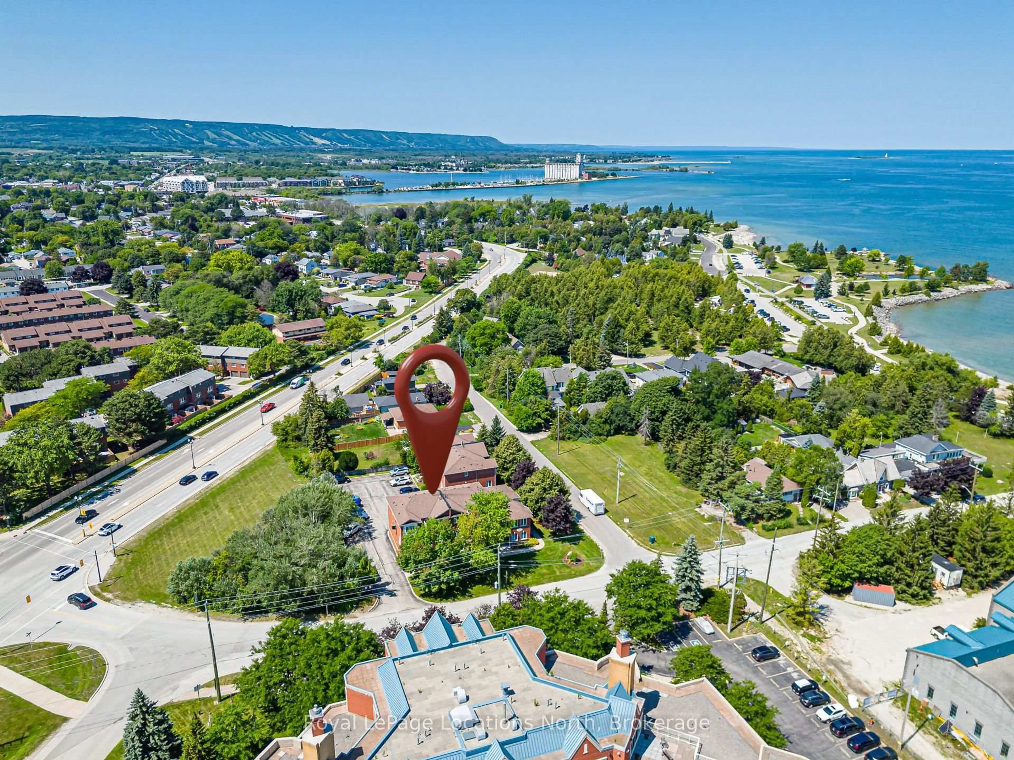 A pic from outside/outdoor area/front of a property/back of a property/a pic from drone, water/lake/river/ocean view for 13 Raglan St #27, Collingwood Ontario L9Y 5J5