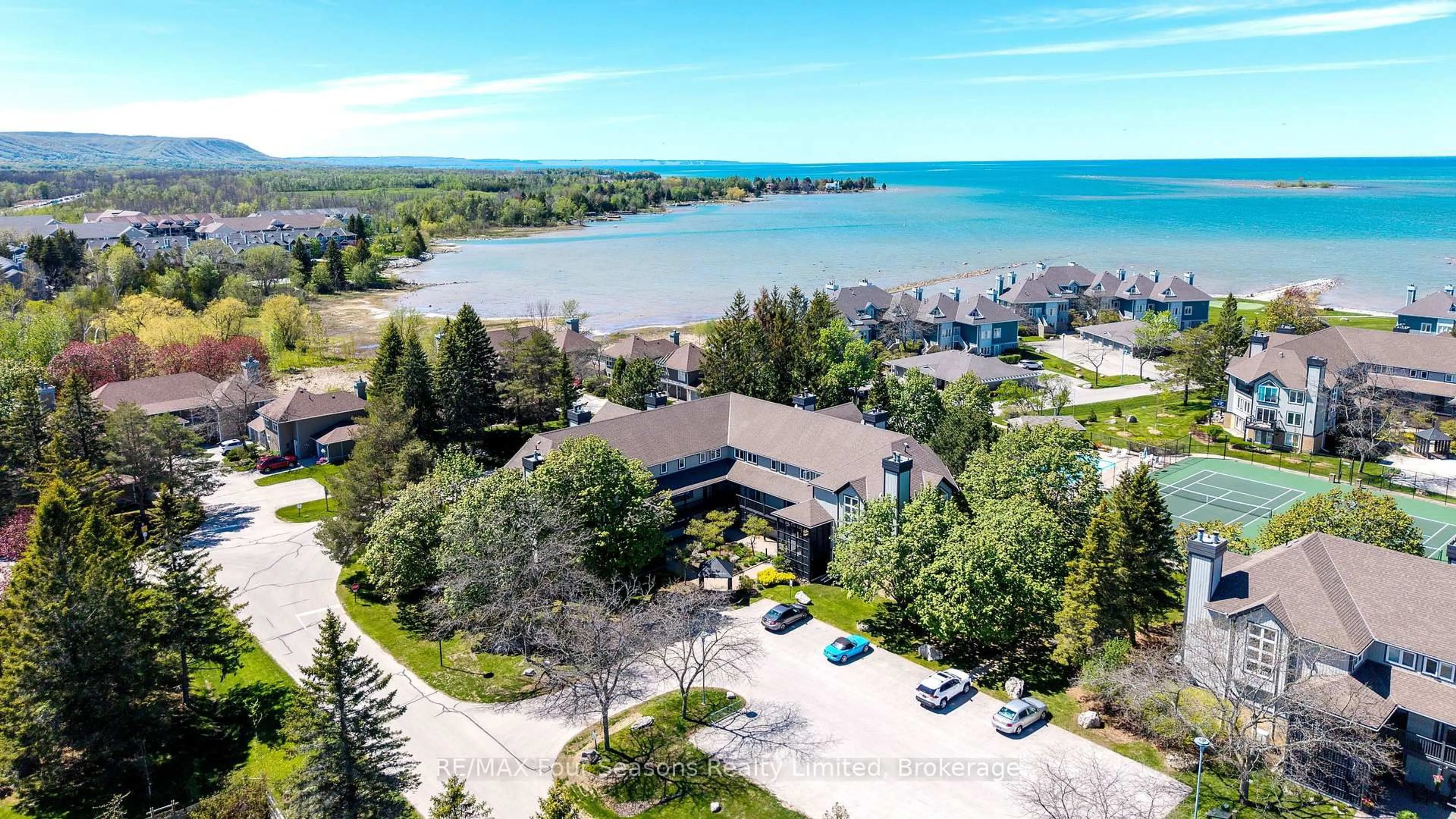 A pic from outside/outdoor area/front of a property/back of a property/a pic from drone, water/lake/river/ocean view for 783 Johnston Park Ave, Collingwood Ontario L9Y 5C7