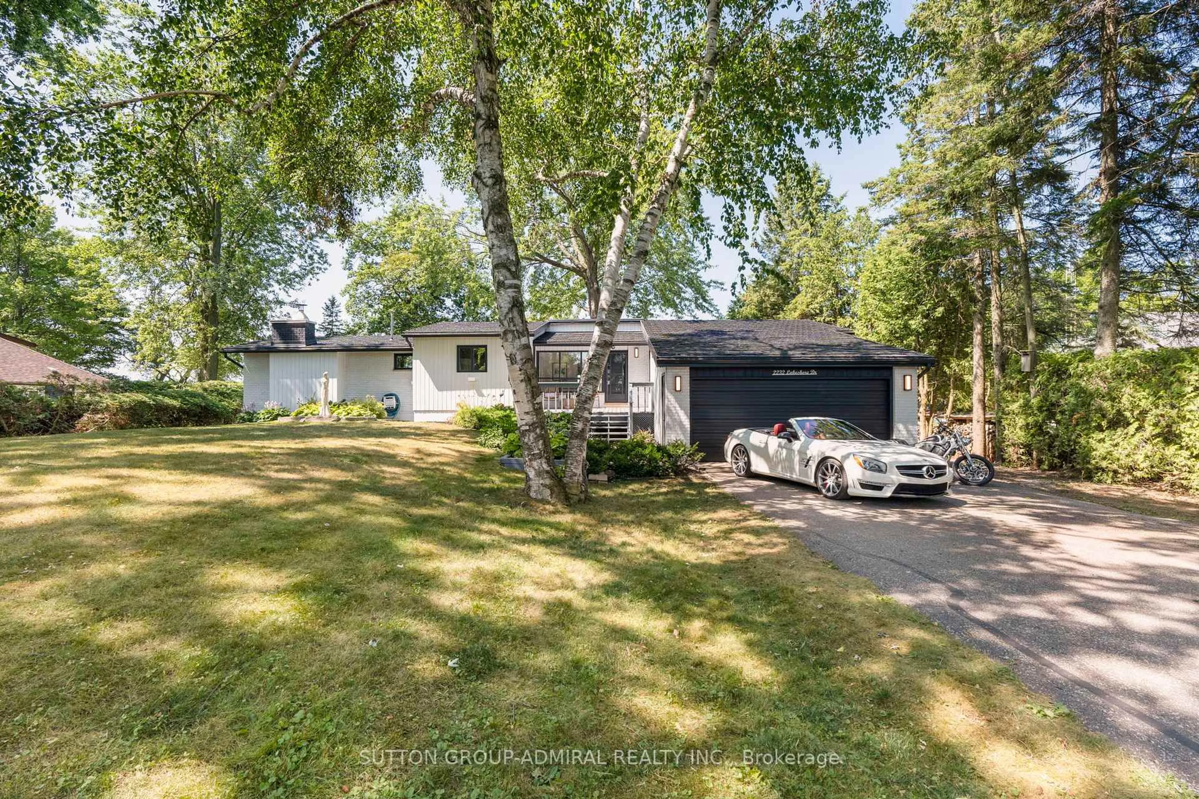 A pic from outside/outdoor area/front of a property/back of a property/a pic from drone, street for 2232 Lakeshore Dr, Ramara Ontario L0K 1B0