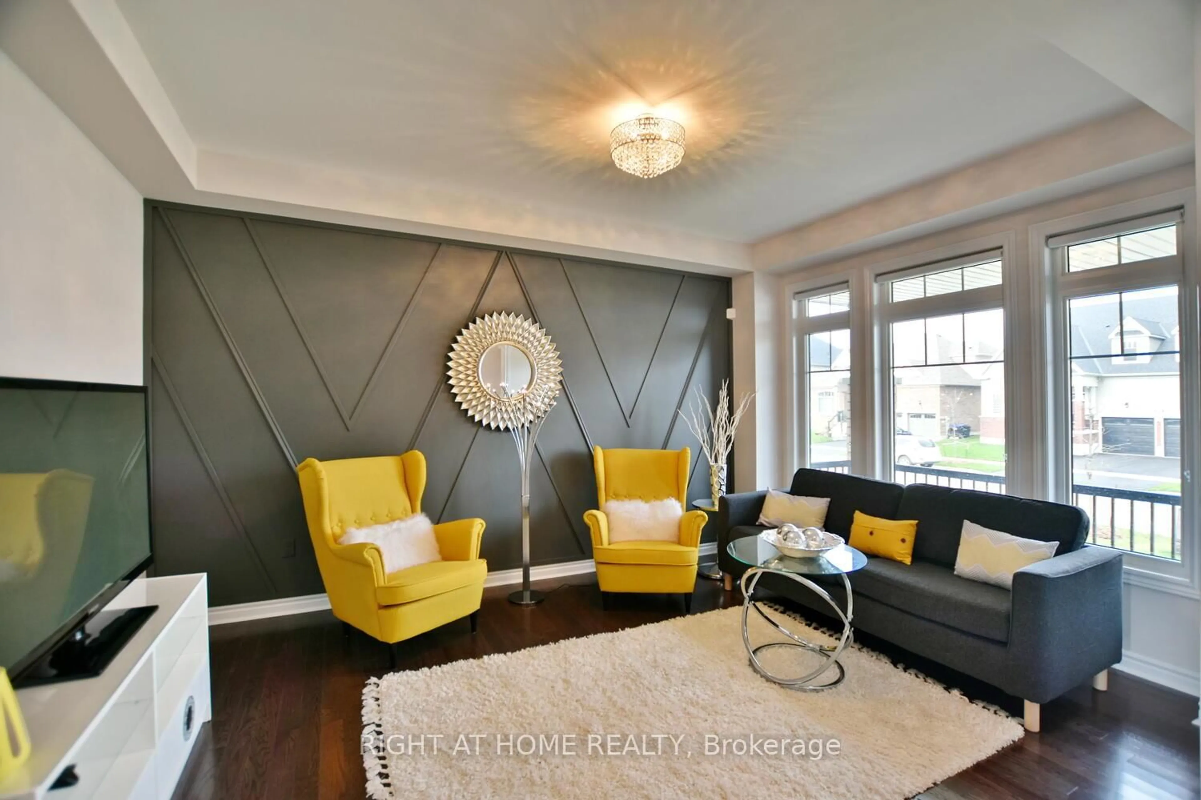Living room with furniture, wood/laminate floor for 94 KIRBY Ave, Collingwood Ontario L9Y 4B6
