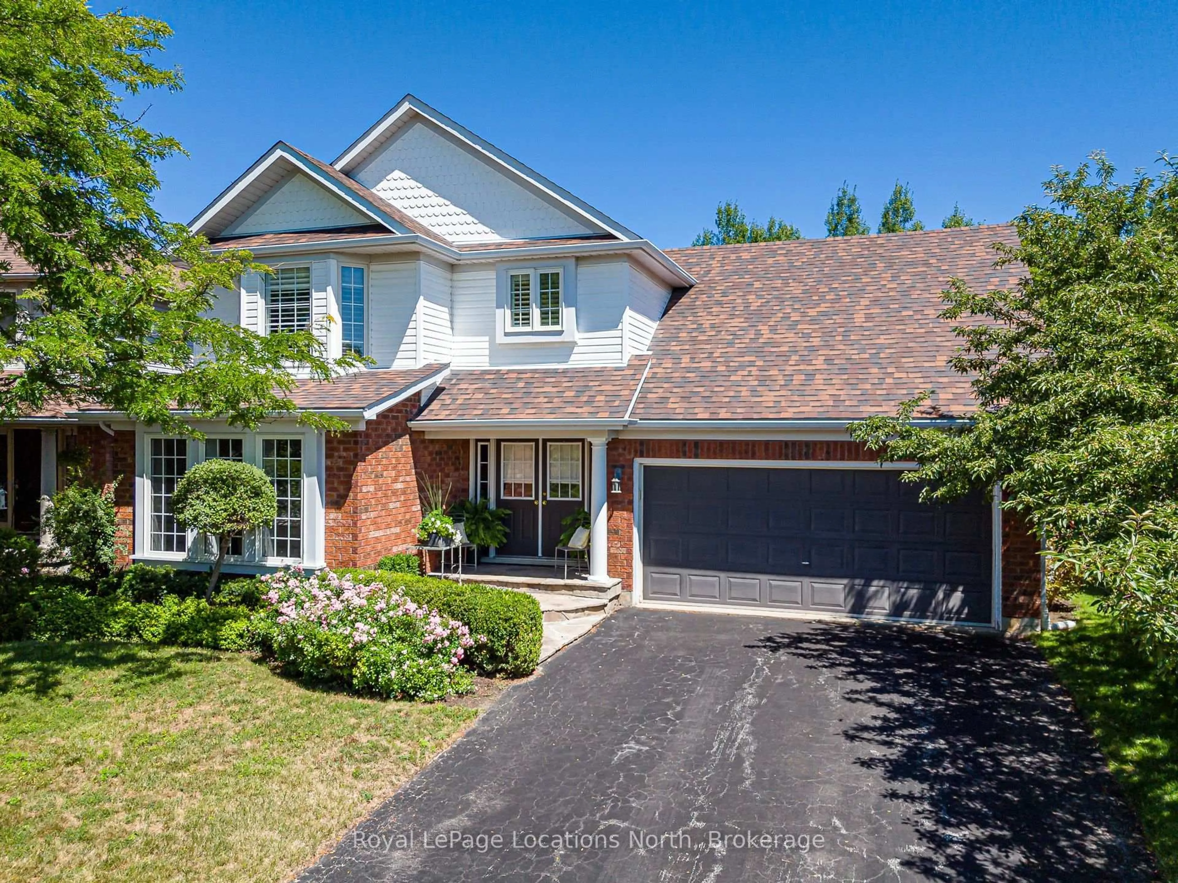 Home with brick exterior material, street for 57 Georgian Meadows Dr, Collingwood Ontario L9Y 5H4