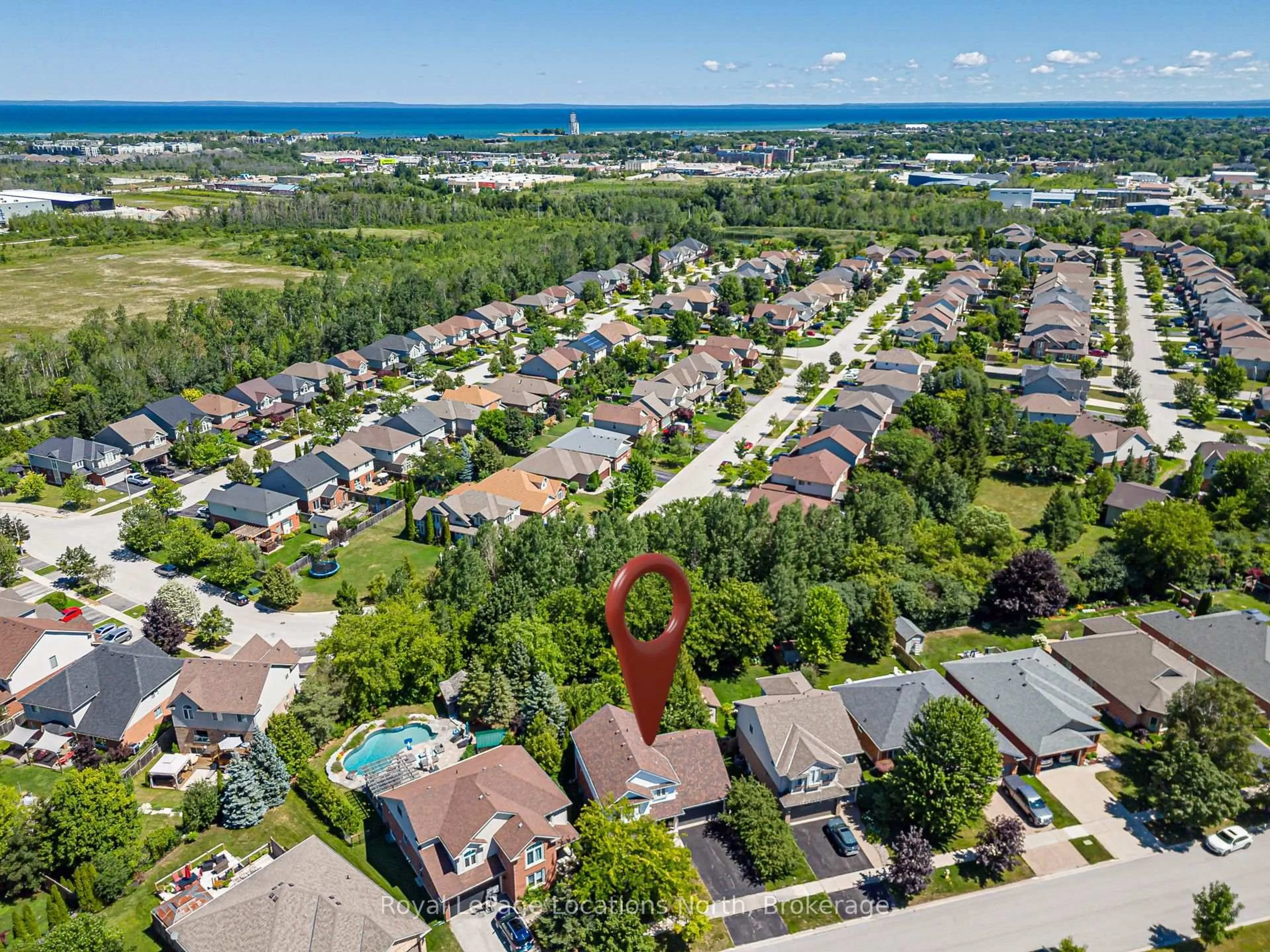 A pic from outside/outdoor area/front of a property/back of a property/a pic from drone, water/lake/river/ocean view for 57 Georgian Meadows Dr, Collingwood Ontario L9Y 5H4