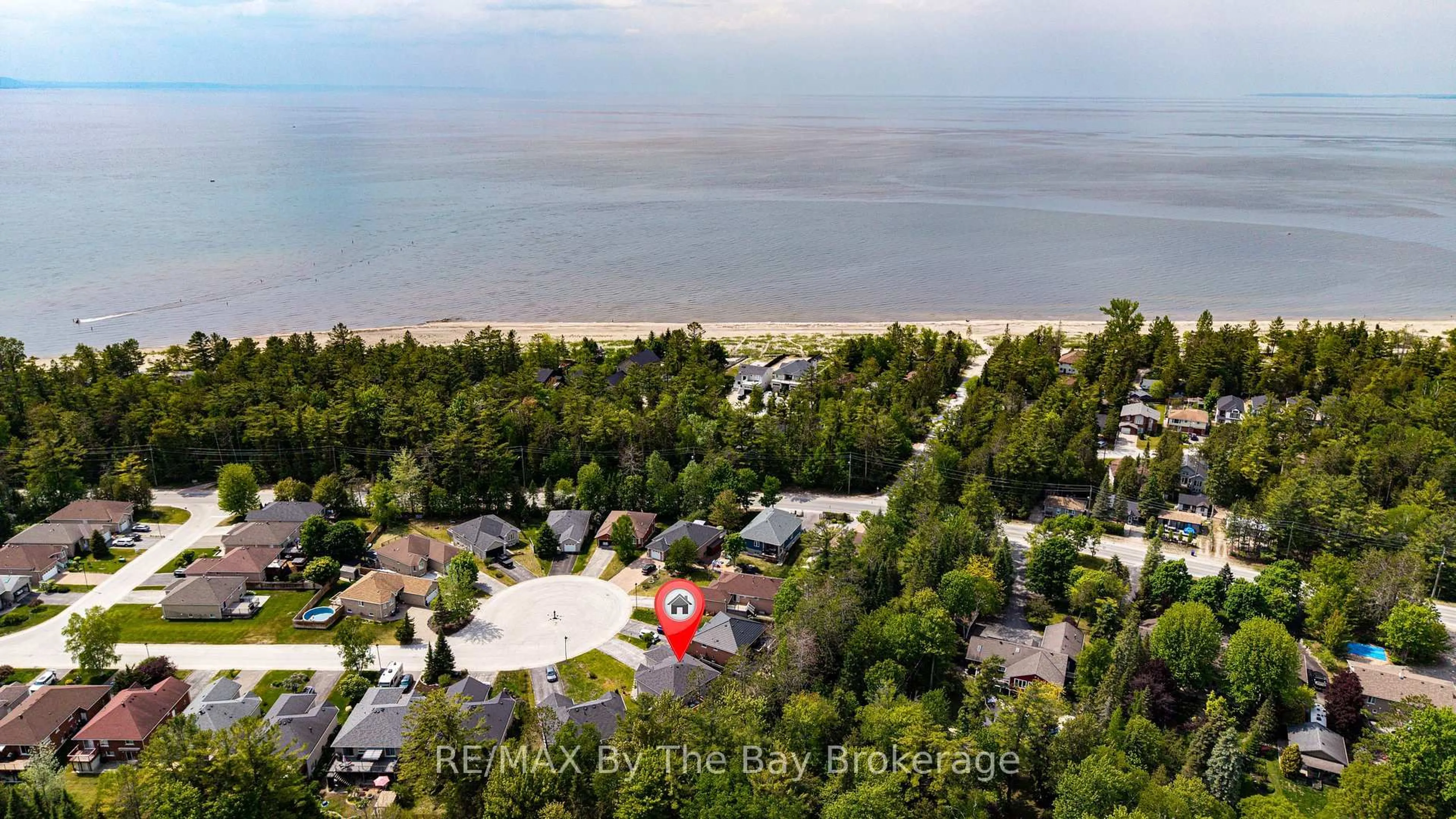 A pic from outside/outdoor area/front of a property/back of a property/a pic from drone, water/lake/river/ocean view for 50 Donato Way, Wasaga Beach Ontario L9Z 1R9