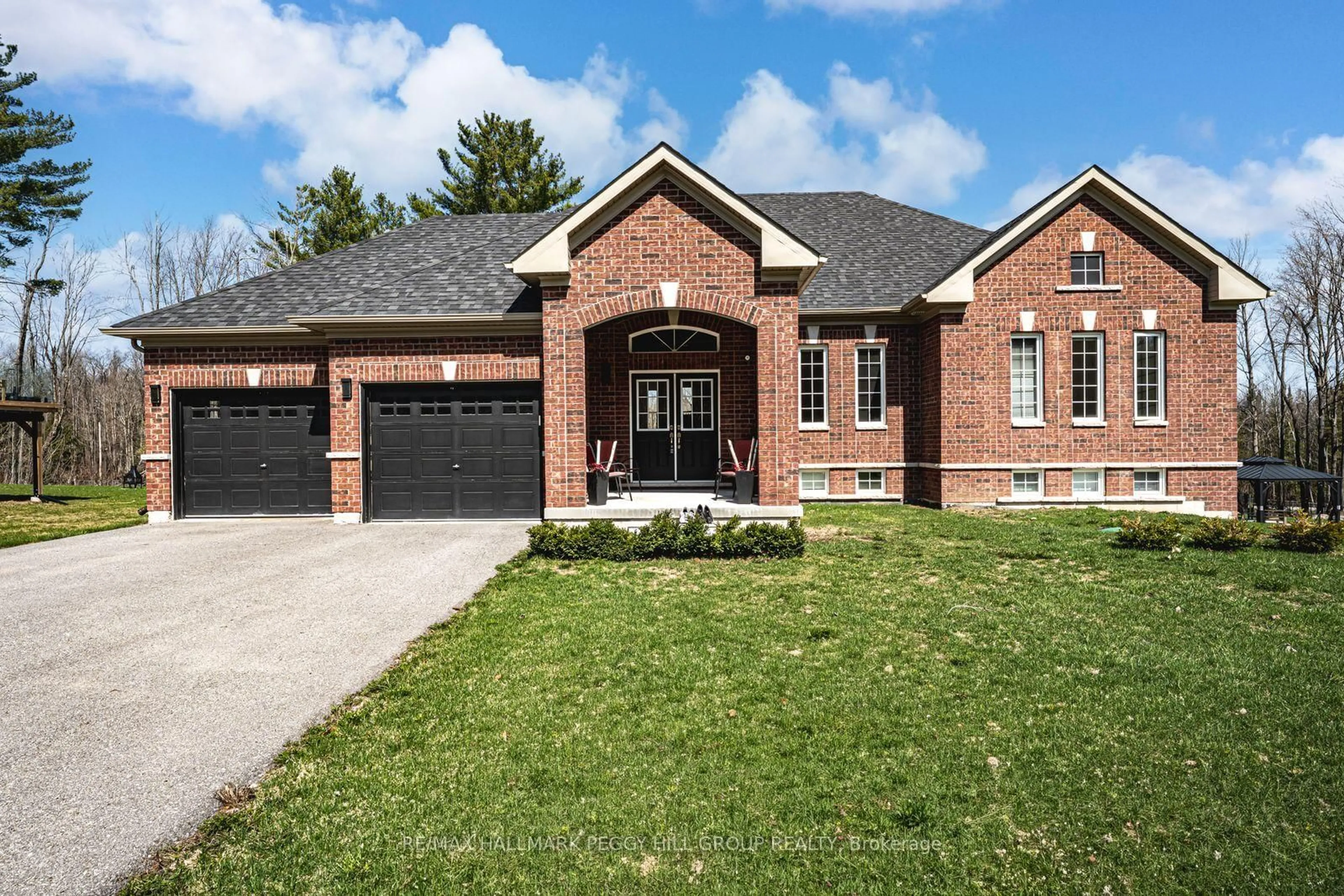 Home with brick exterior material, street for 82 Diamond Valley Dr, Oro-Medonte Ontario L0L 2E0