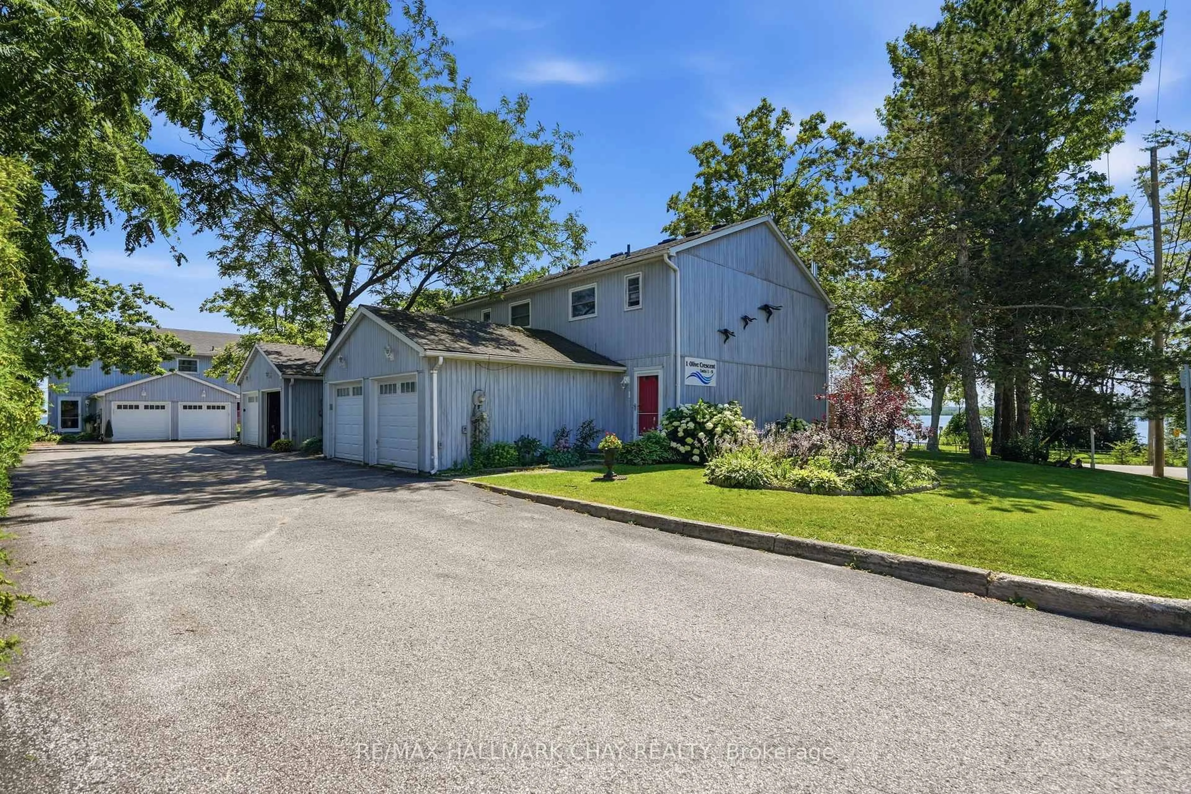 A pic from outside/outdoor area/front of a property/back of a property/a pic from drone, water/lake/river/ocean view for 1 Olive Cres #4, Orillia Ontario L3V 7N5