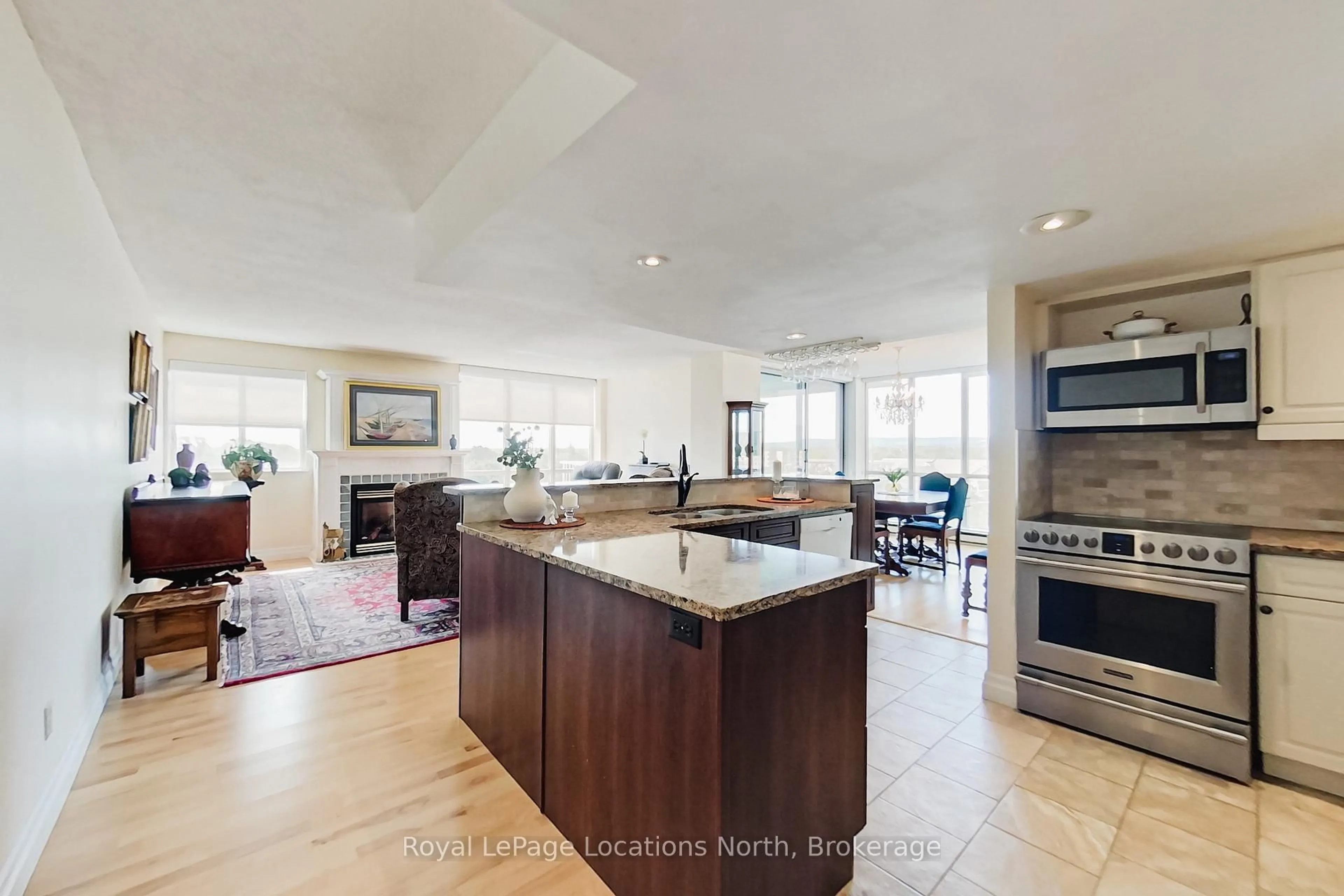 Open concept kitchen, ceramic/tile floor for 24 Ramblings Way #706, Collingwood Ontario L9Y 5C6