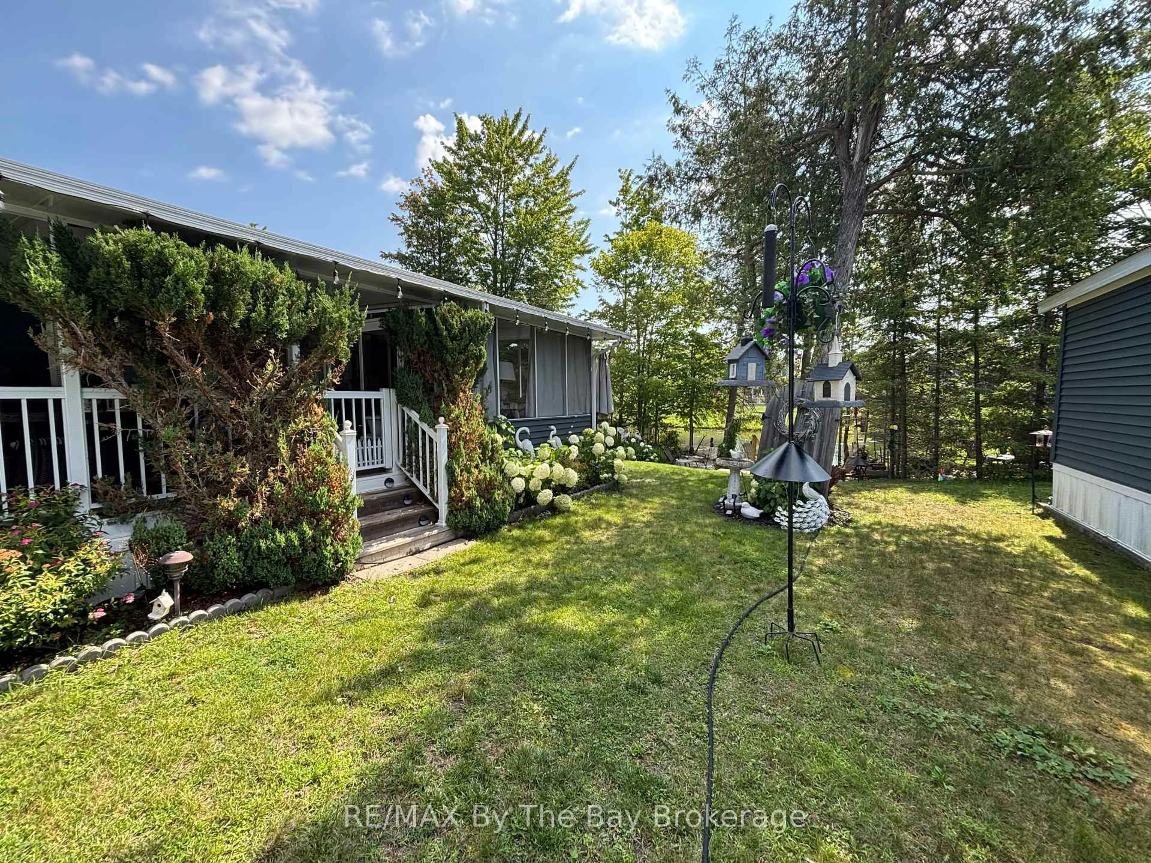 A pic from outside/outdoor area/front of a property/back of a property/a pic from drone, forest/trees view for 9 WHITE PINES Tr, Wasaga Beach Ontario L9Z 1X7
