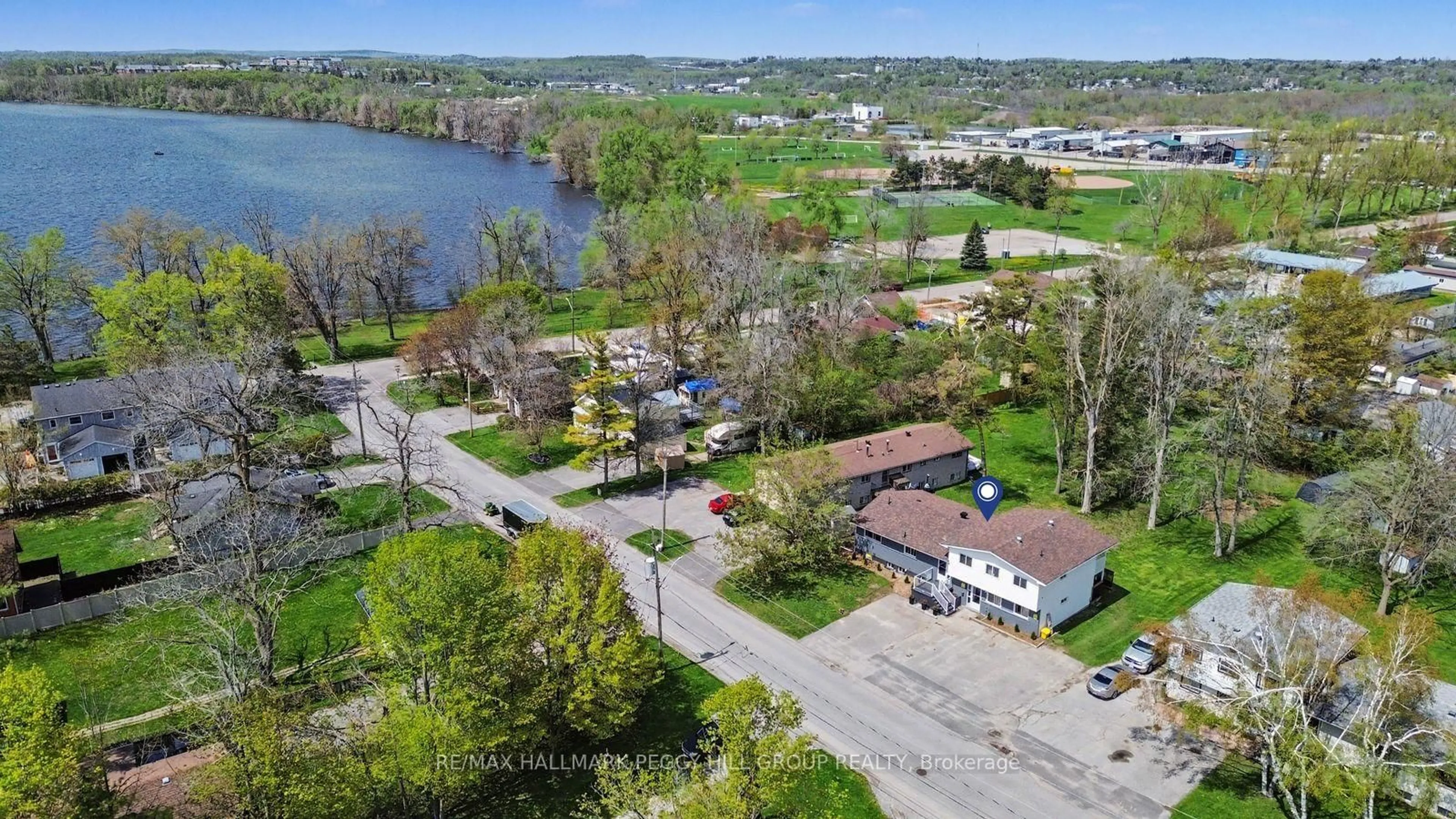 A pic from outside/outdoor area/front of a property/back of a property/a pic from drone, water/lake/river/ocean view for 22 Olive Cres, Orillia Ontario L3V 1G1