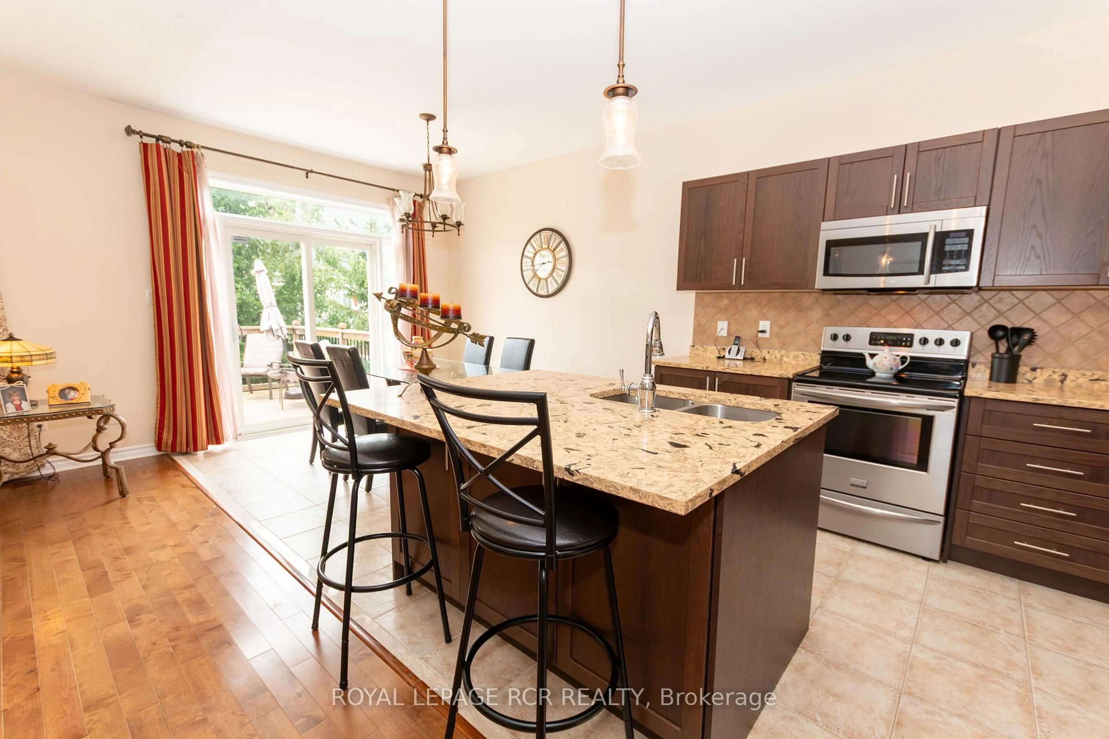 Open concept kitchen, ceramic/tile floor for 135 White Sands Way, Wasaga Beach Ontario L9Z 0E3