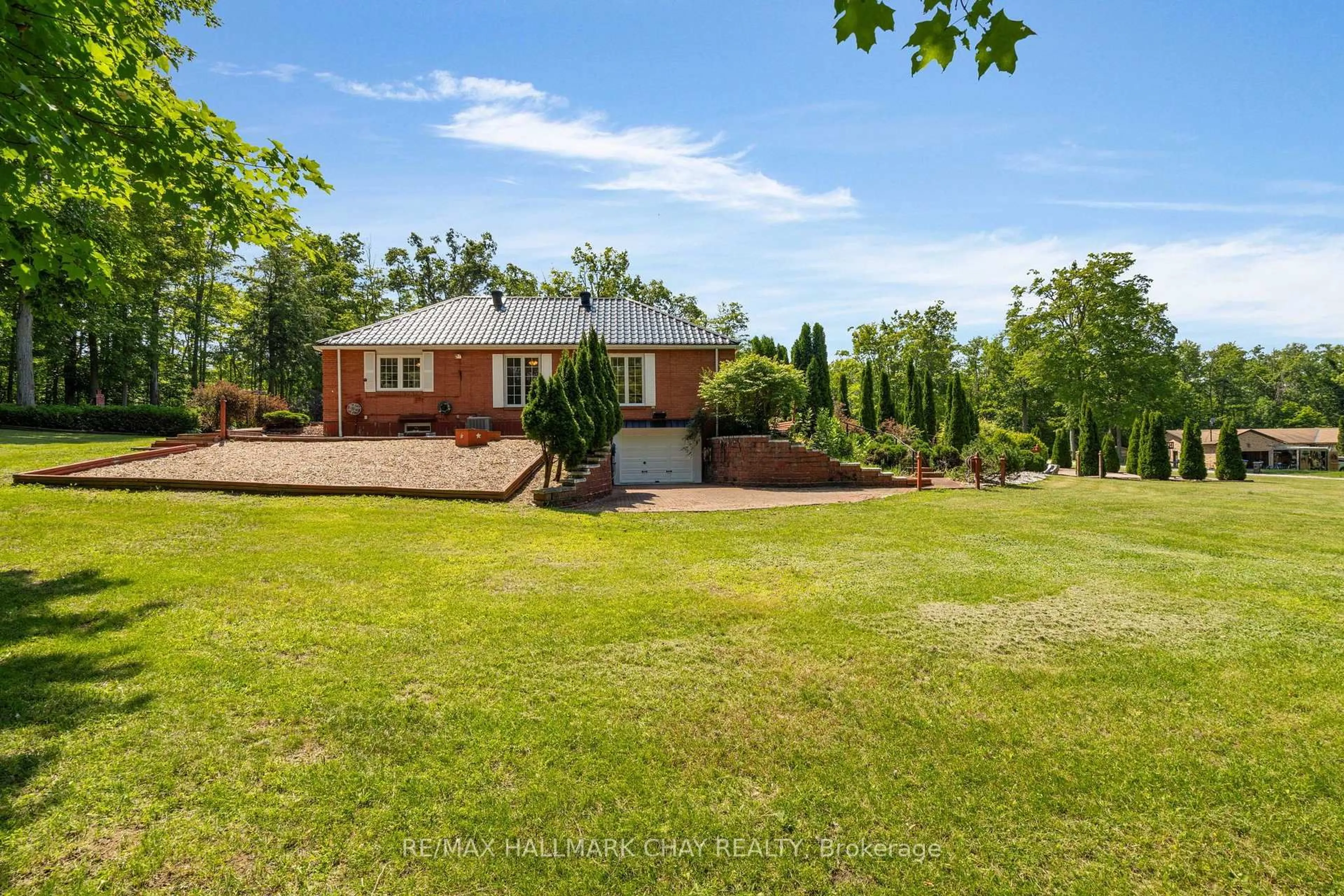 A pic from outside/outdoor area/front of a property/back of a property/a pic from drone, water/lake/river/ocean view for 24 Woodland Cres, Oro-Medonte Ontario L4M 4Y8