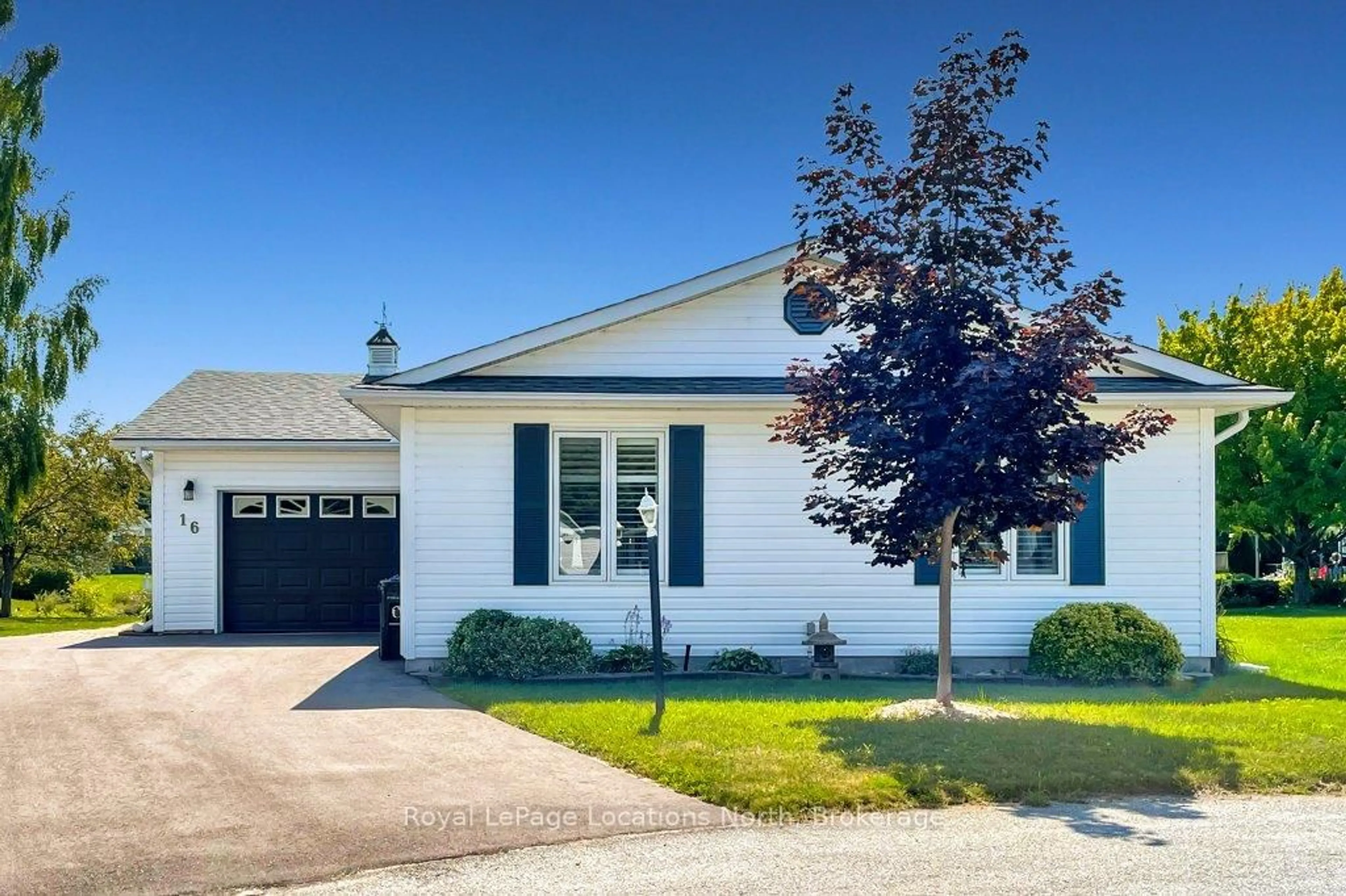 Home with vinyl exterior material, street for 16 Atlantic Ave, Wasaga Beach Ontario L9Z 3A8