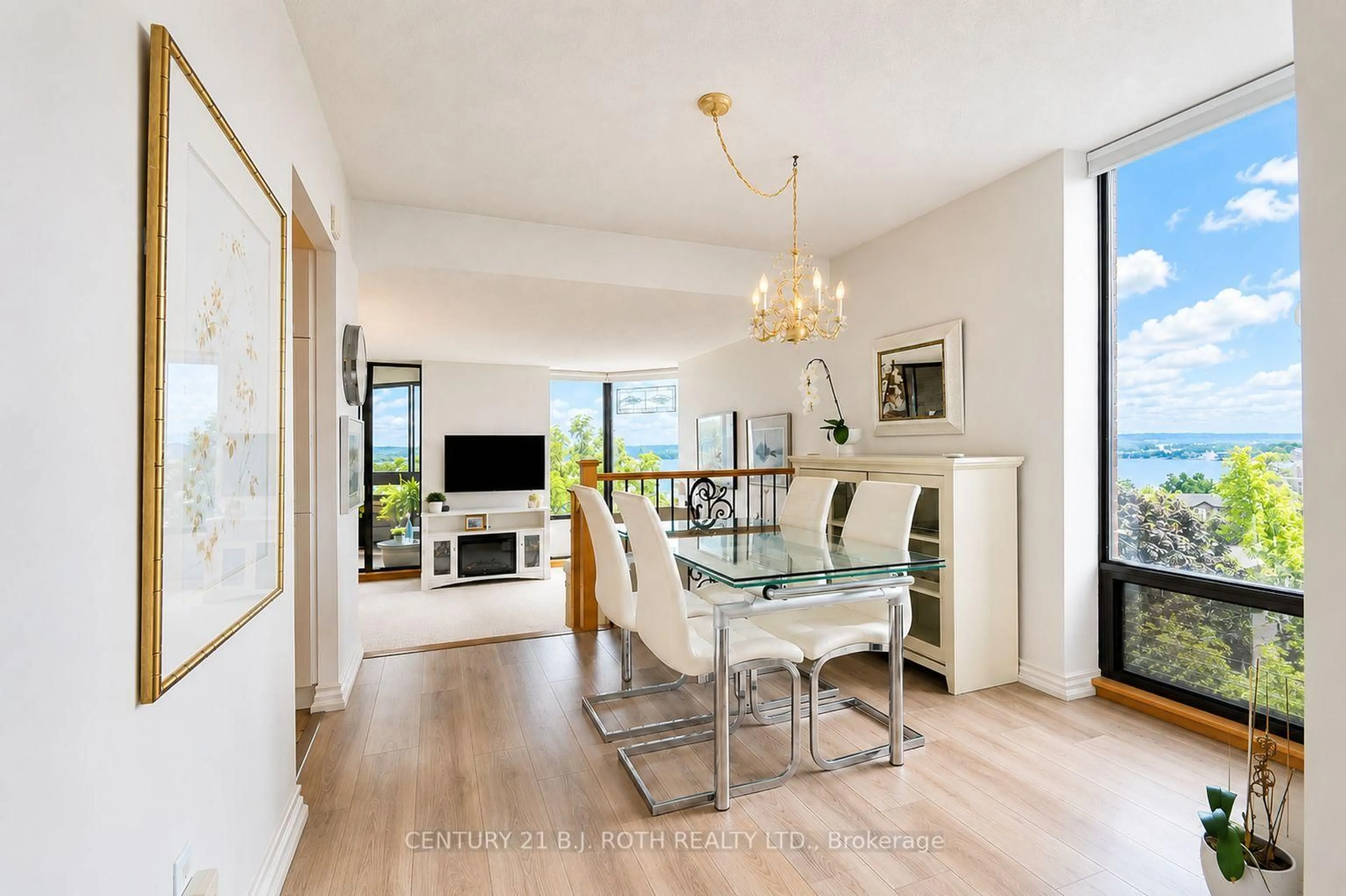 Dining room, wood/laminate floor for 181 Collier St #508, Barrie Ontario L4M 5L6