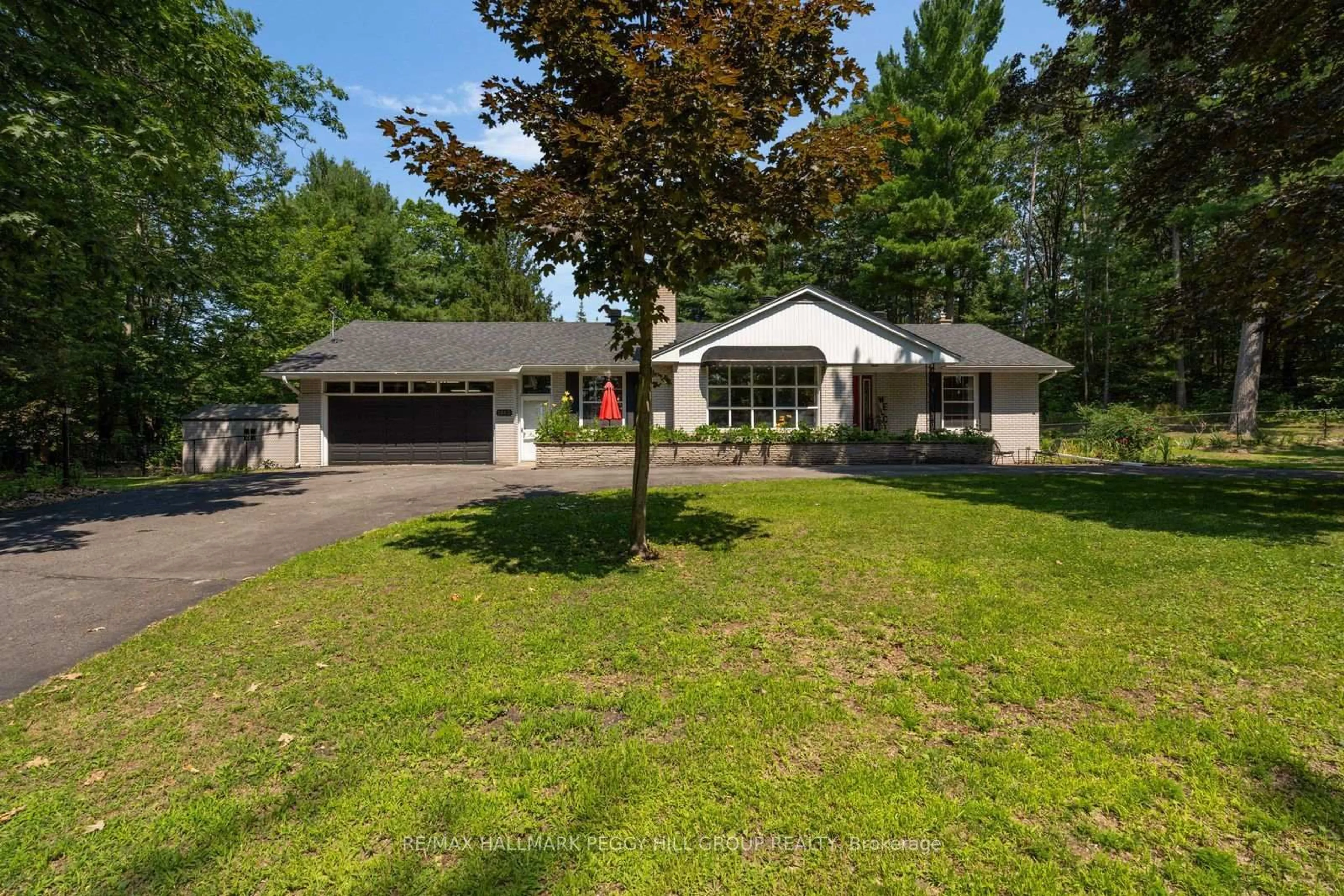 A pic from outside/outdoor area/front of a property/back of a property/a pic from drone, street for 1863 Tiny Beaches Rd, Tiny Ontario L0L 1P1