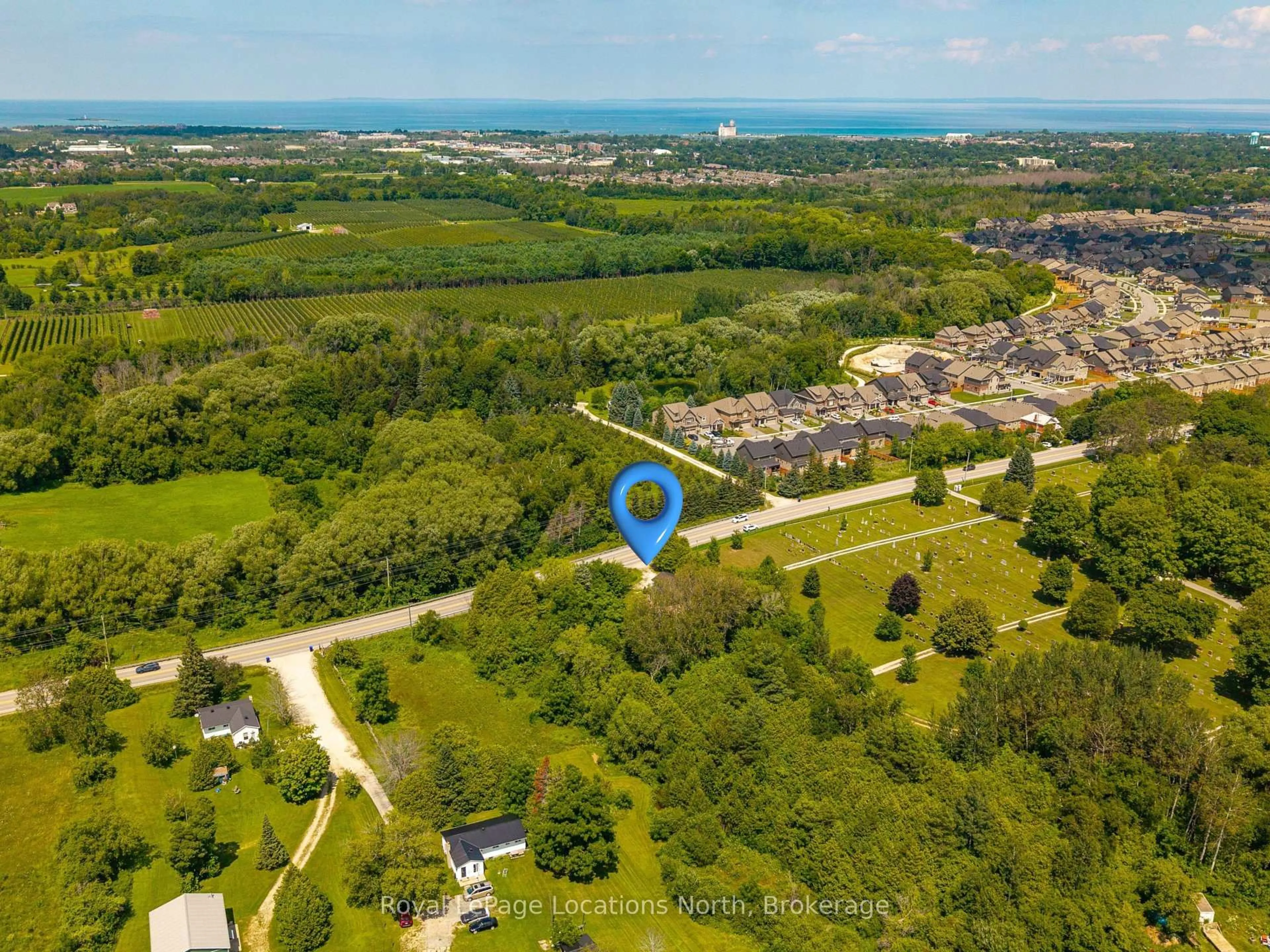 A pic from outside/outdoor area/front of a property/back of a property/a pic from drone, water/lake/river/ocean view for 8081 Poplar Sdrd, Clearview Ontario L9Y 3Y9
