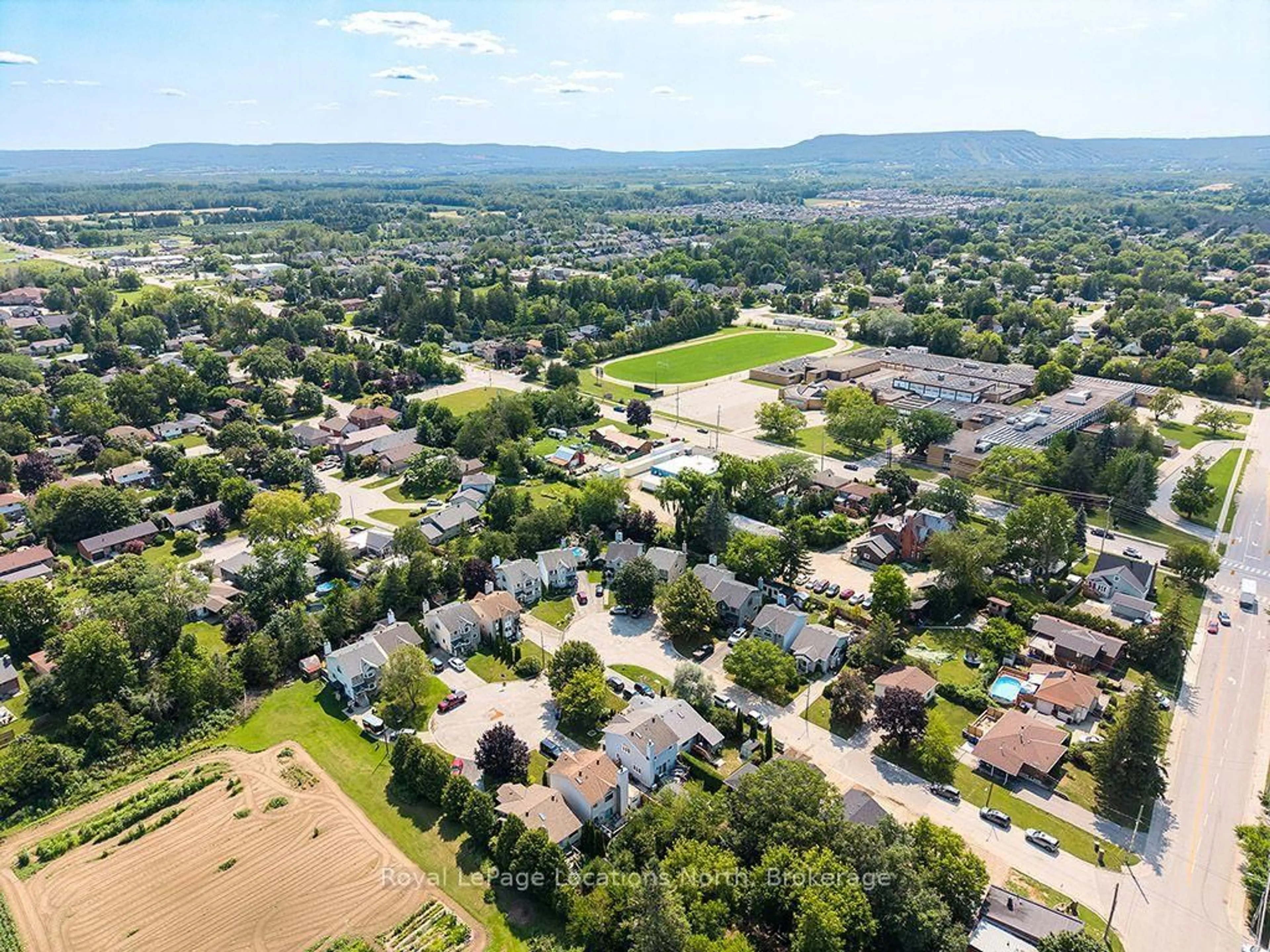 A pic from outside/outdoor area/front of a property/back of a property/a pic from drone, mountain view for 724 Ste Marie St, Collingwood Ontario L9Y 4T5