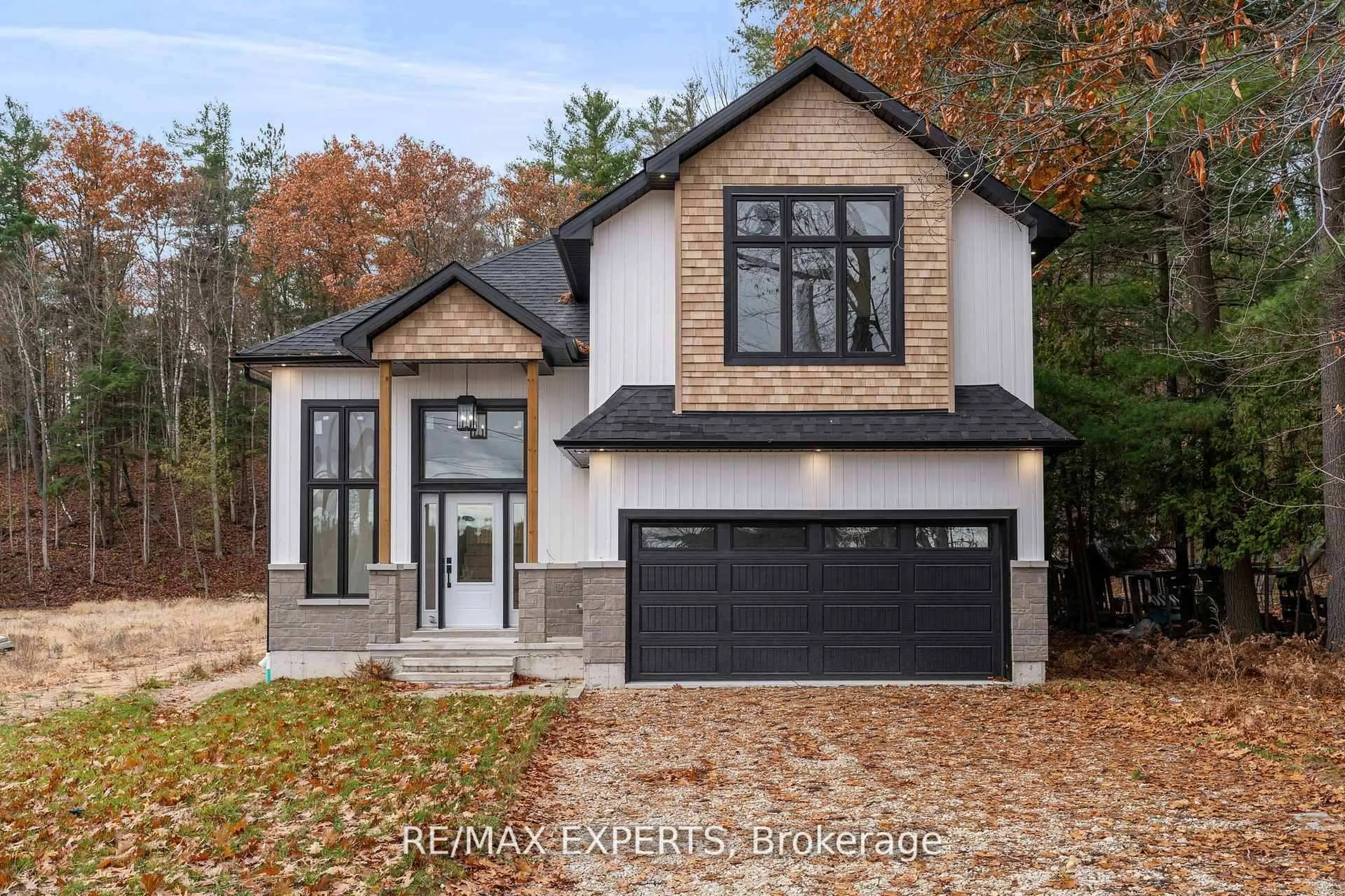 Home with brick exterior material, street for 506 Golf Course Rd, Wasaga Beach Ontario L9Z 1S5