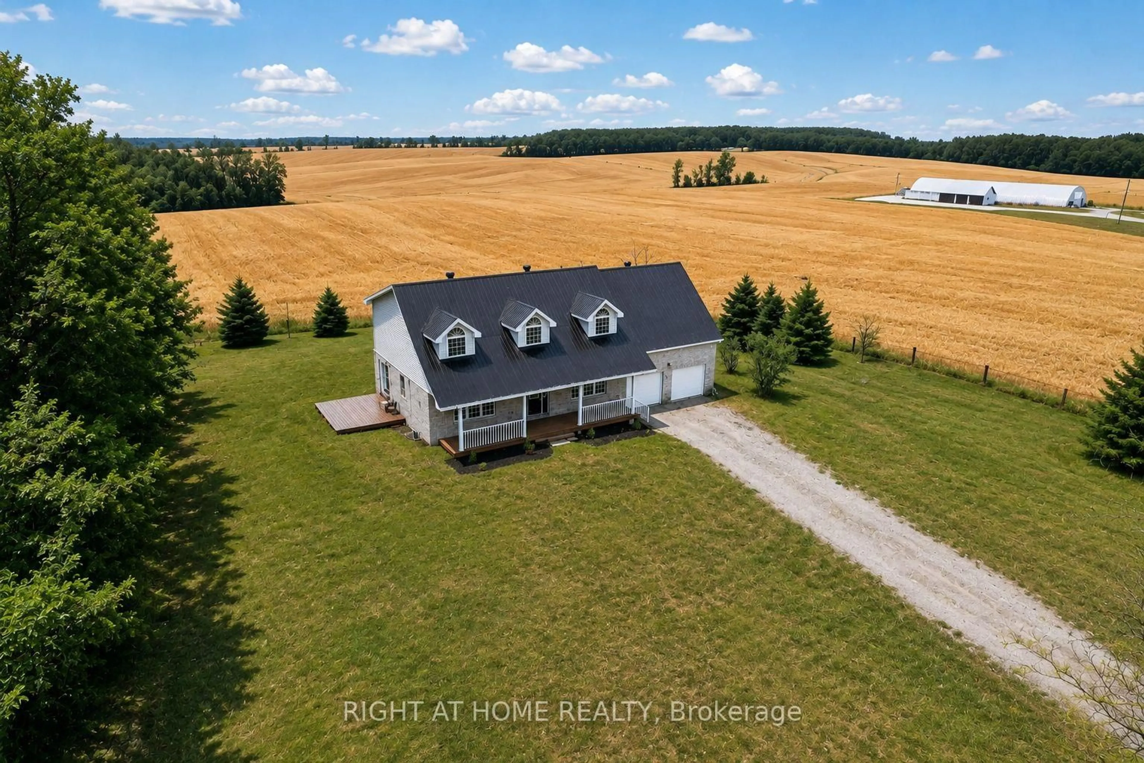 A pic from outside/outdoor area/front of a property/back of a property/a pic from drone, unknown for 6435 12/13 Stayner Sdrd, Clearview Ontario L0M 1N0