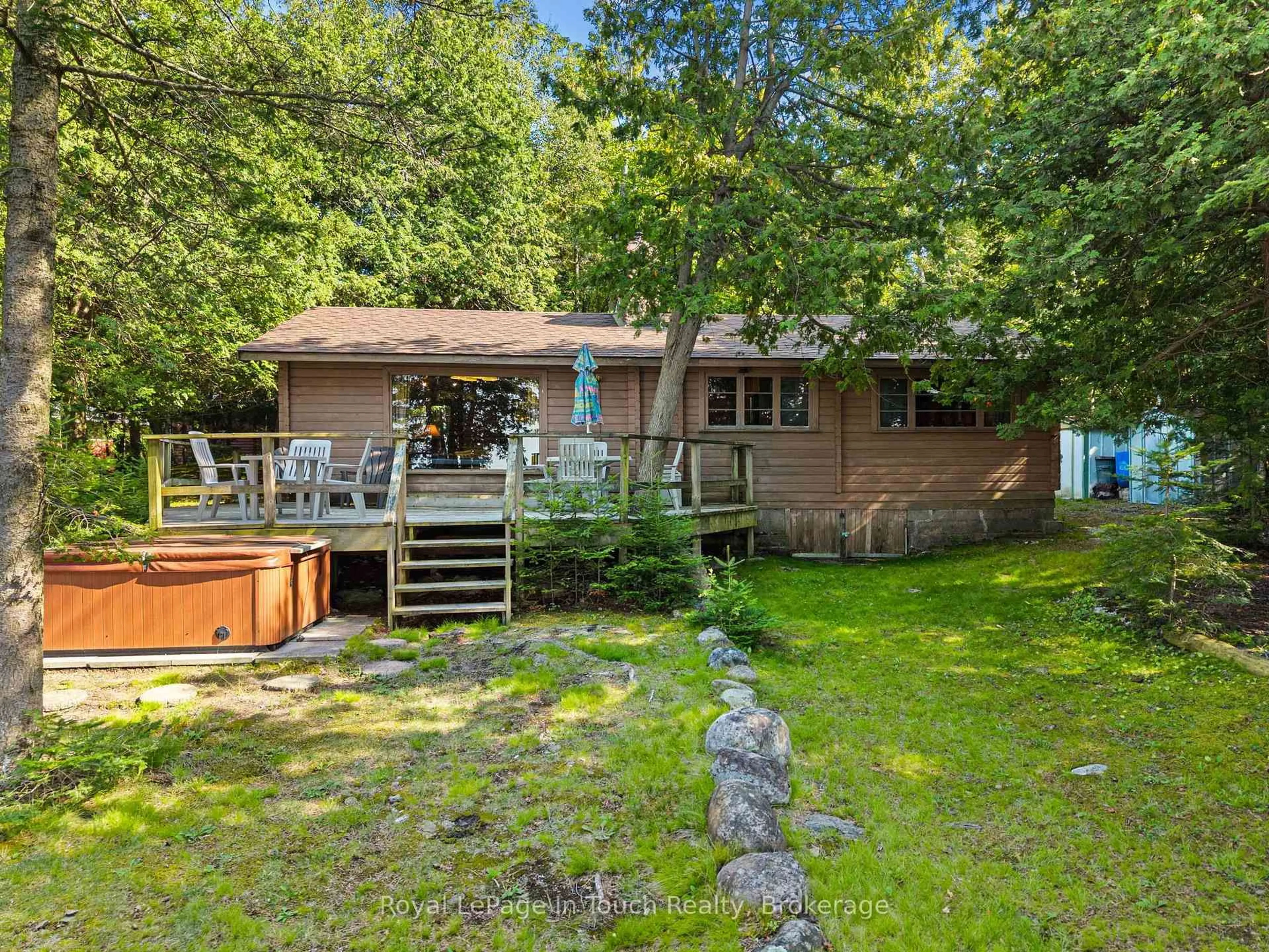 A pic from outside/outdoor area/front of a property/back of a property/a pic from drone, water/lake/river/ocean view for 25 Chippewa Cres, Tiny Ontario L9M 0C4