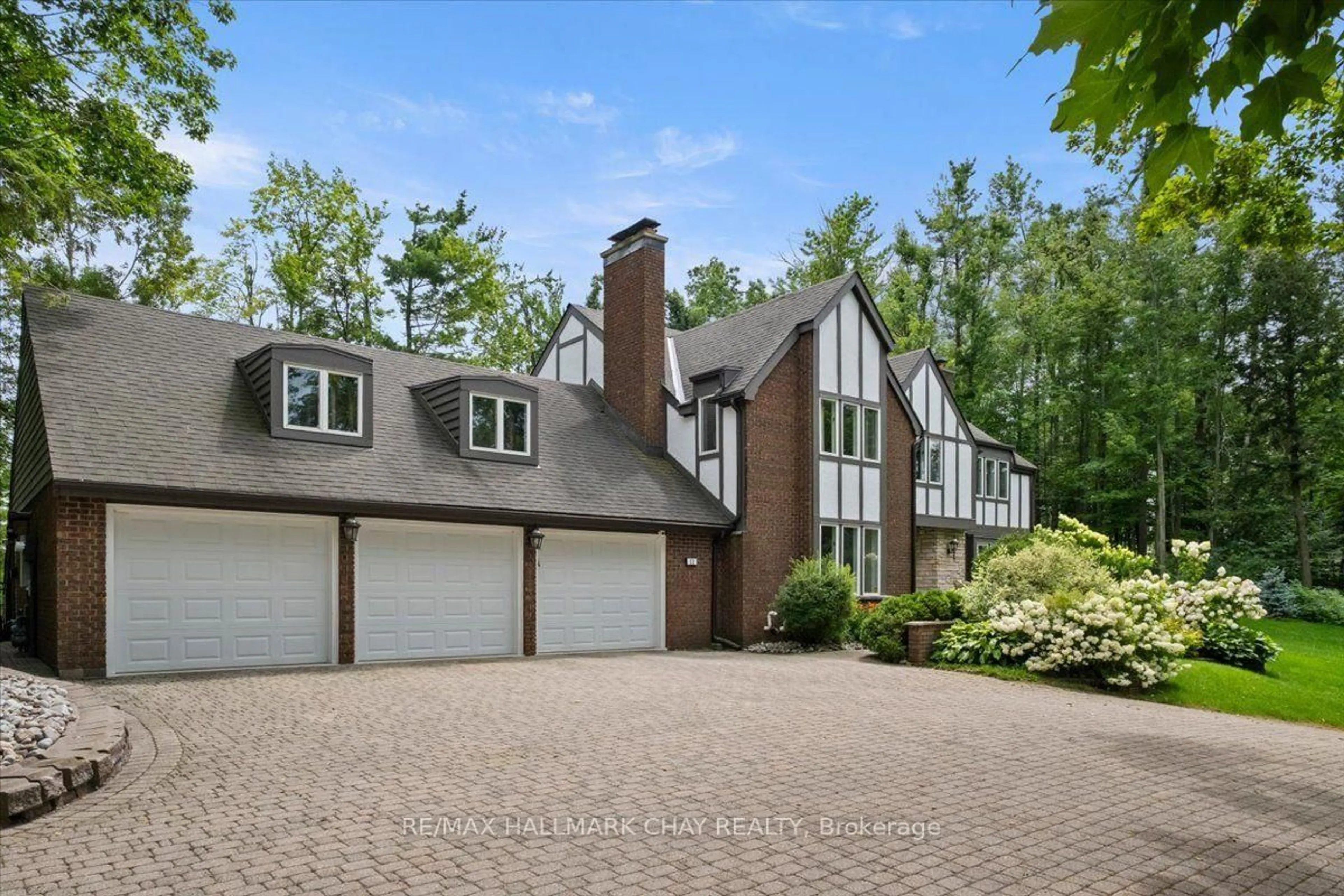 Home with brick exterior material, street for 11 Park Tr, Springwater Ontario L9X 0L3