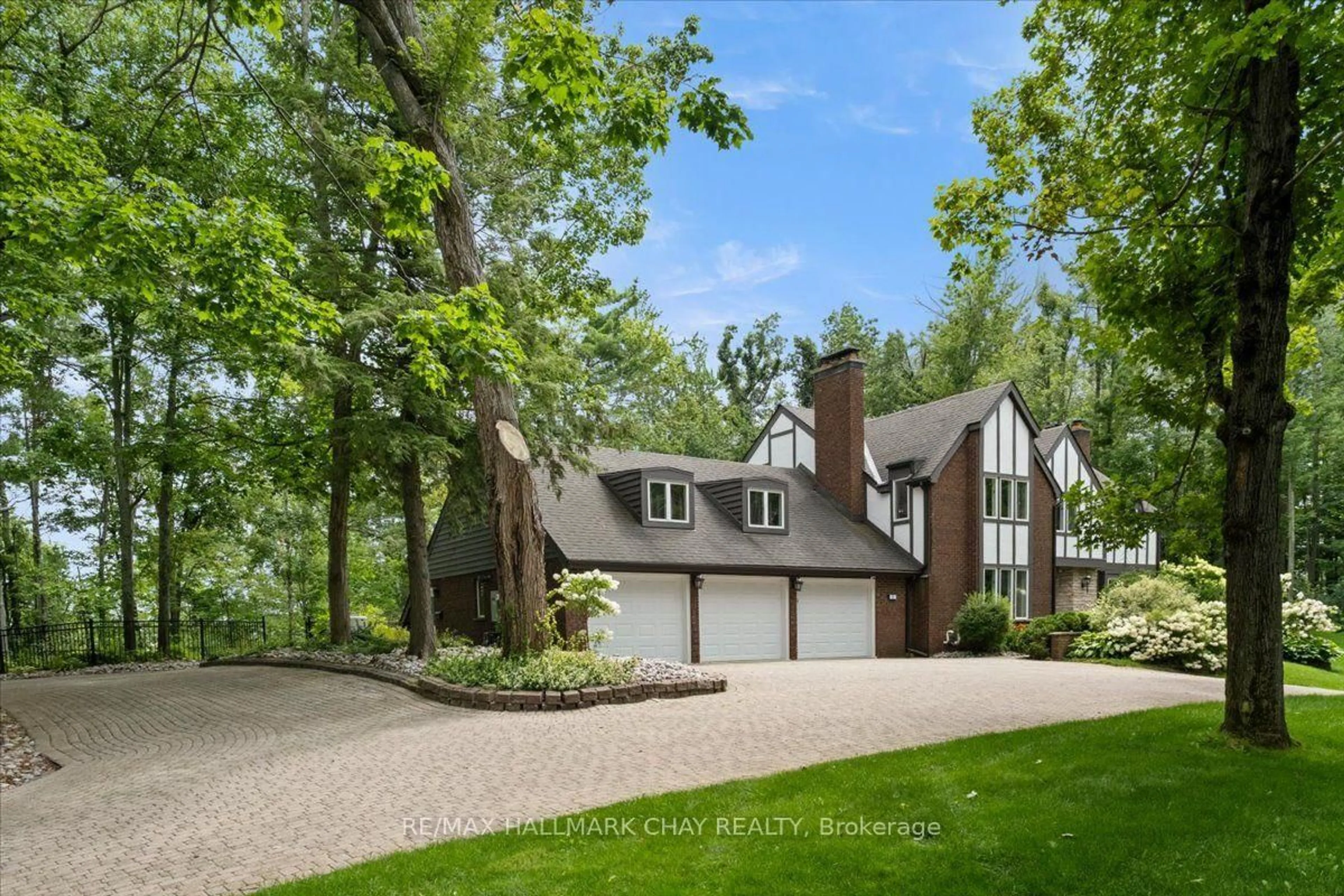 Home with brick exterior material, street for 11 Park Tr, Springwater Ontario L9X 0L3