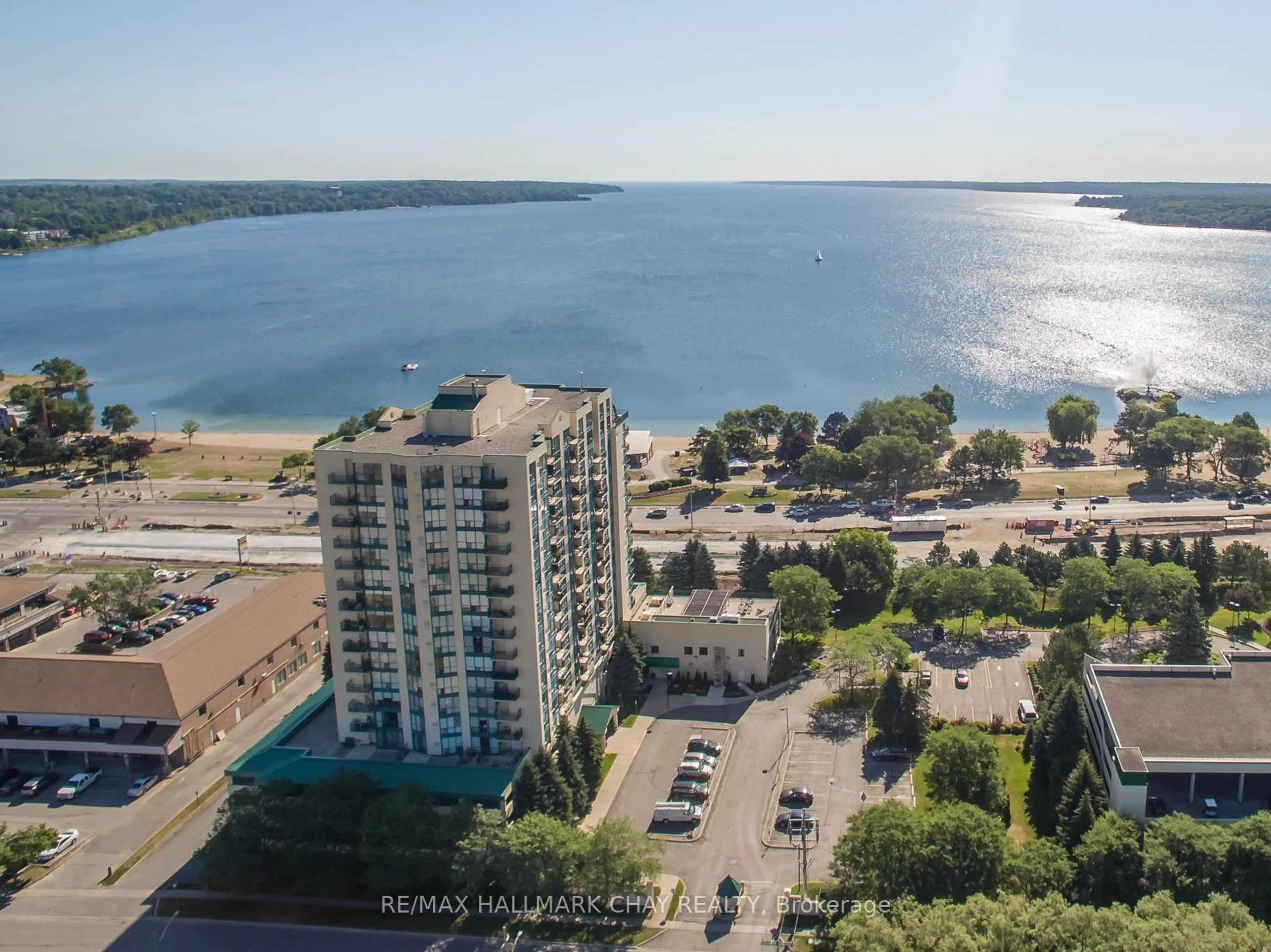 A pic from outside/outdoor area/front of a property/back of a property/a pic from drone, water/lake/river/ocean view for 65 Ellen St #602, Barrie Ontario L4N 3A5