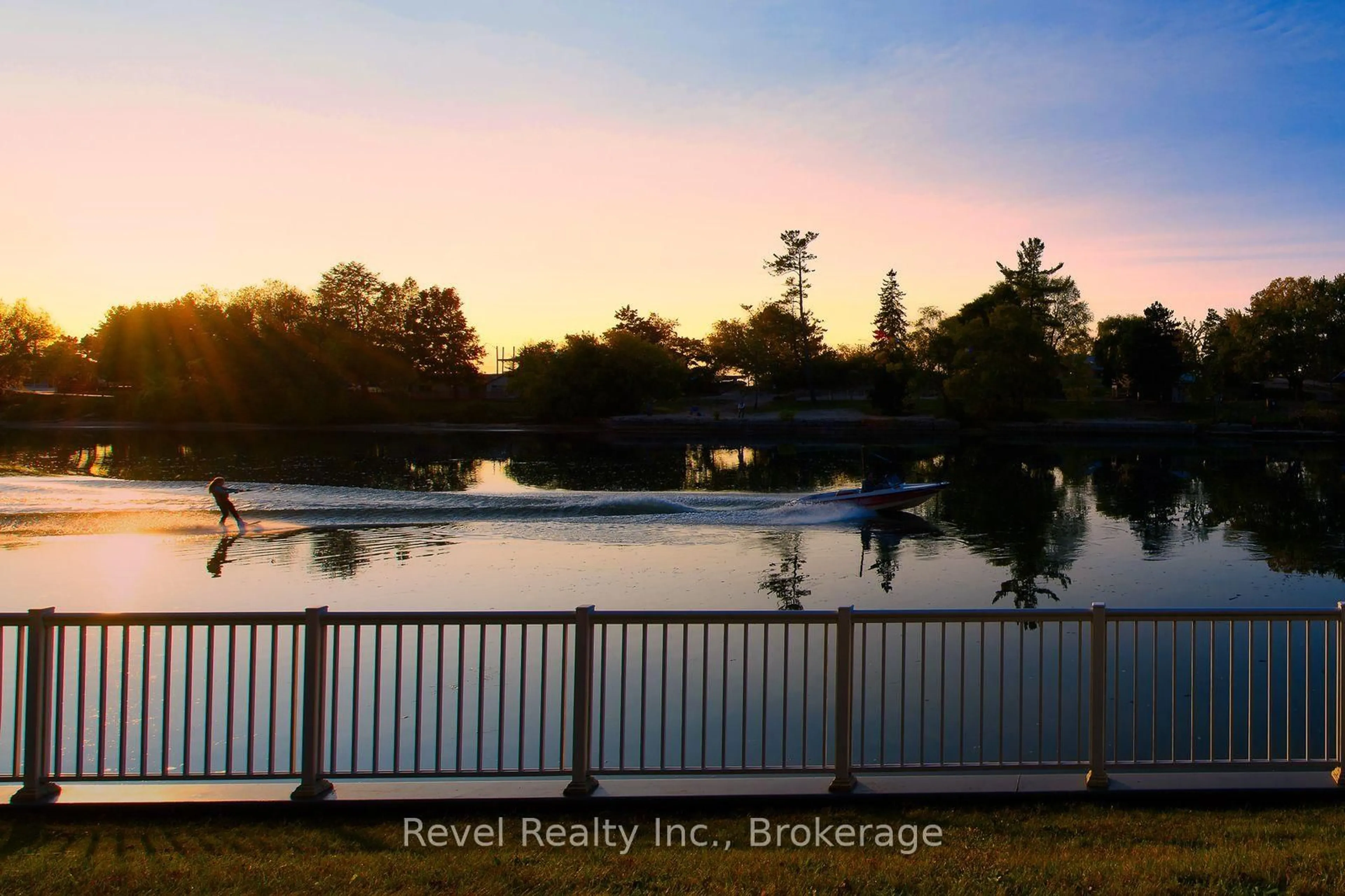 A pic from outside/outdoor area/front of a property/back of a property/a pic from drone, water/lake/river/ocean view for 4-64 RIVER RD E River Rd #4, Wasaga Beach Ontario L9Z 2L1
