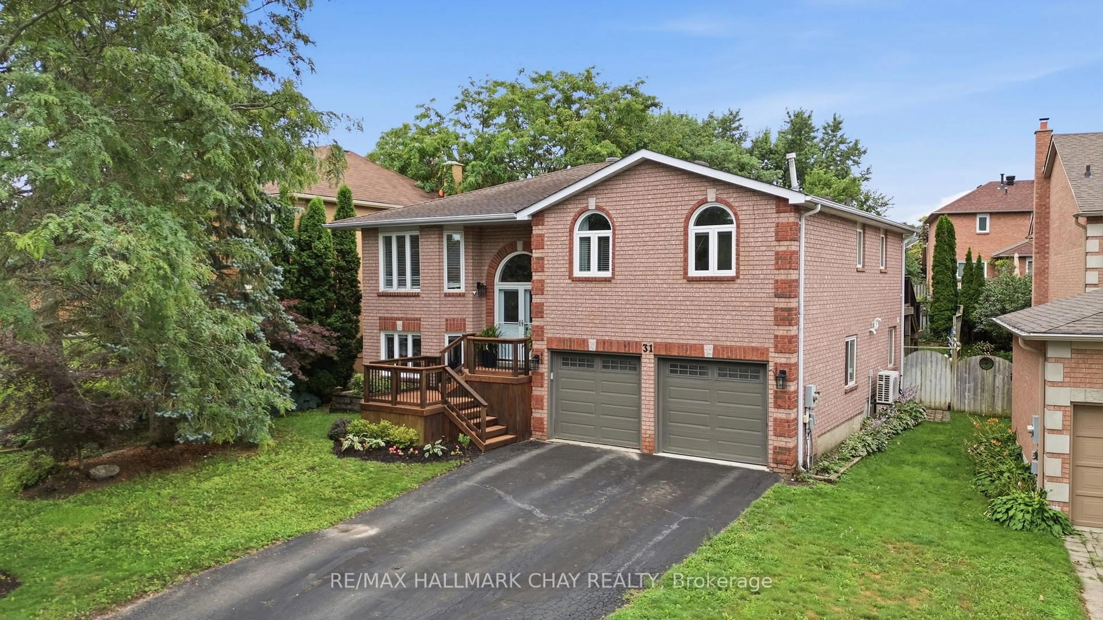 Home with brick exterior material, street for 31 Falling Brook Dr, Barrie Ontario L4N 7E9
