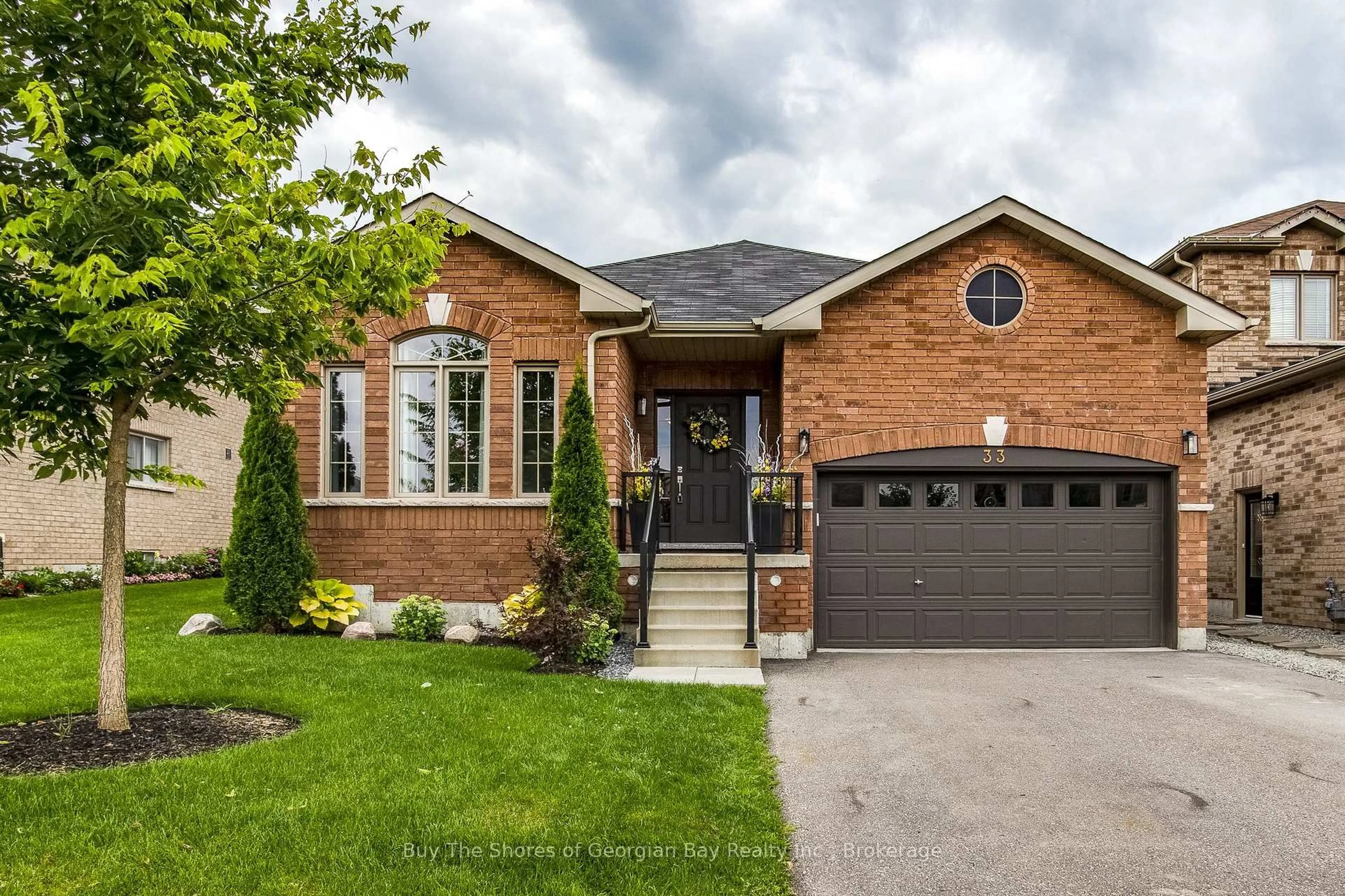 Home with brick exterior material, street for 33 Beausoleil Dr, Penetanguishene Ontario L9M 0V8