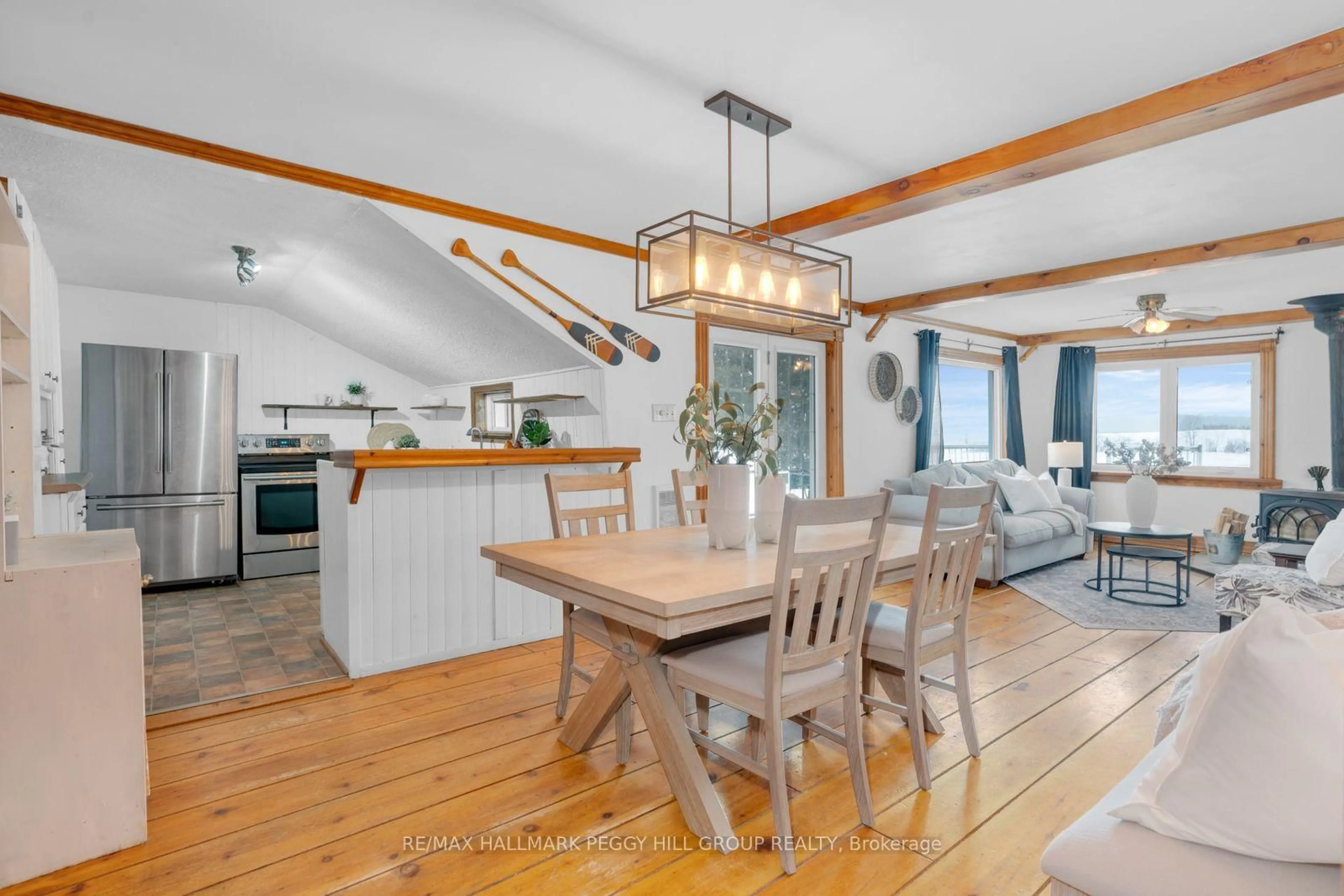 Open concept kitchen, wood/laminate floor for 1424 Klondike Park Rd, Clearview Ontario L0M 1S0