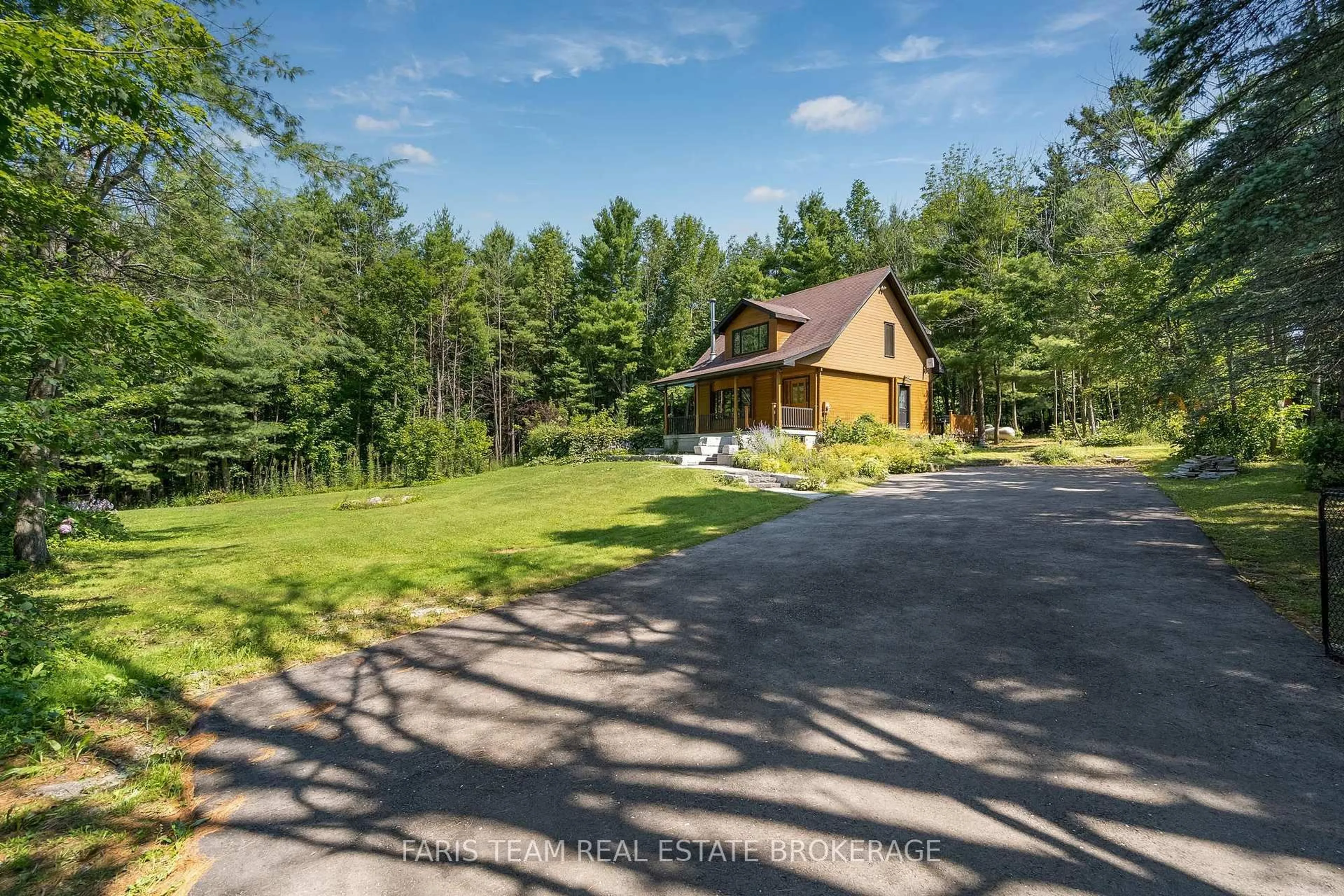 A pic from outside/outdoor area/front of a property/back of a property/a pic from drone, water/lake/river/ocean view for 2668 Mcdonald Rd, Springwater Ontario L0L 1P0