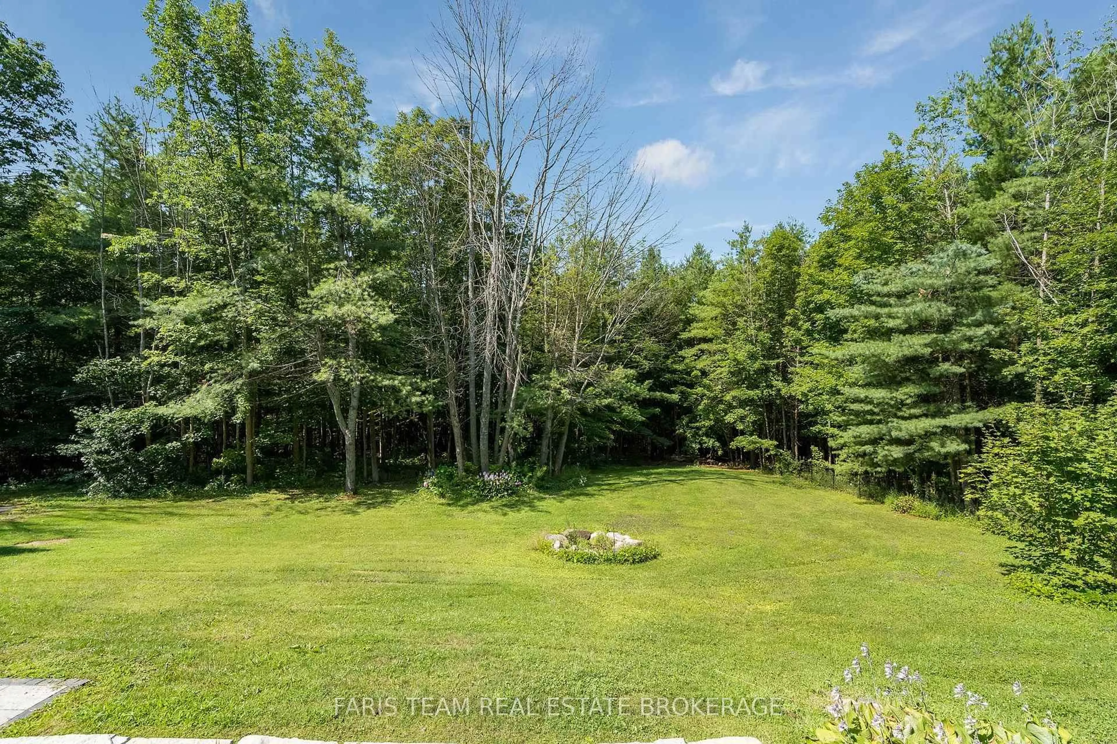 A pic from outside/outdoor area/front of a property/back of a property/a pic from drone, forest/trees view for 2668 Mcdonald Rd, Springwater Ontario L0L 1P0