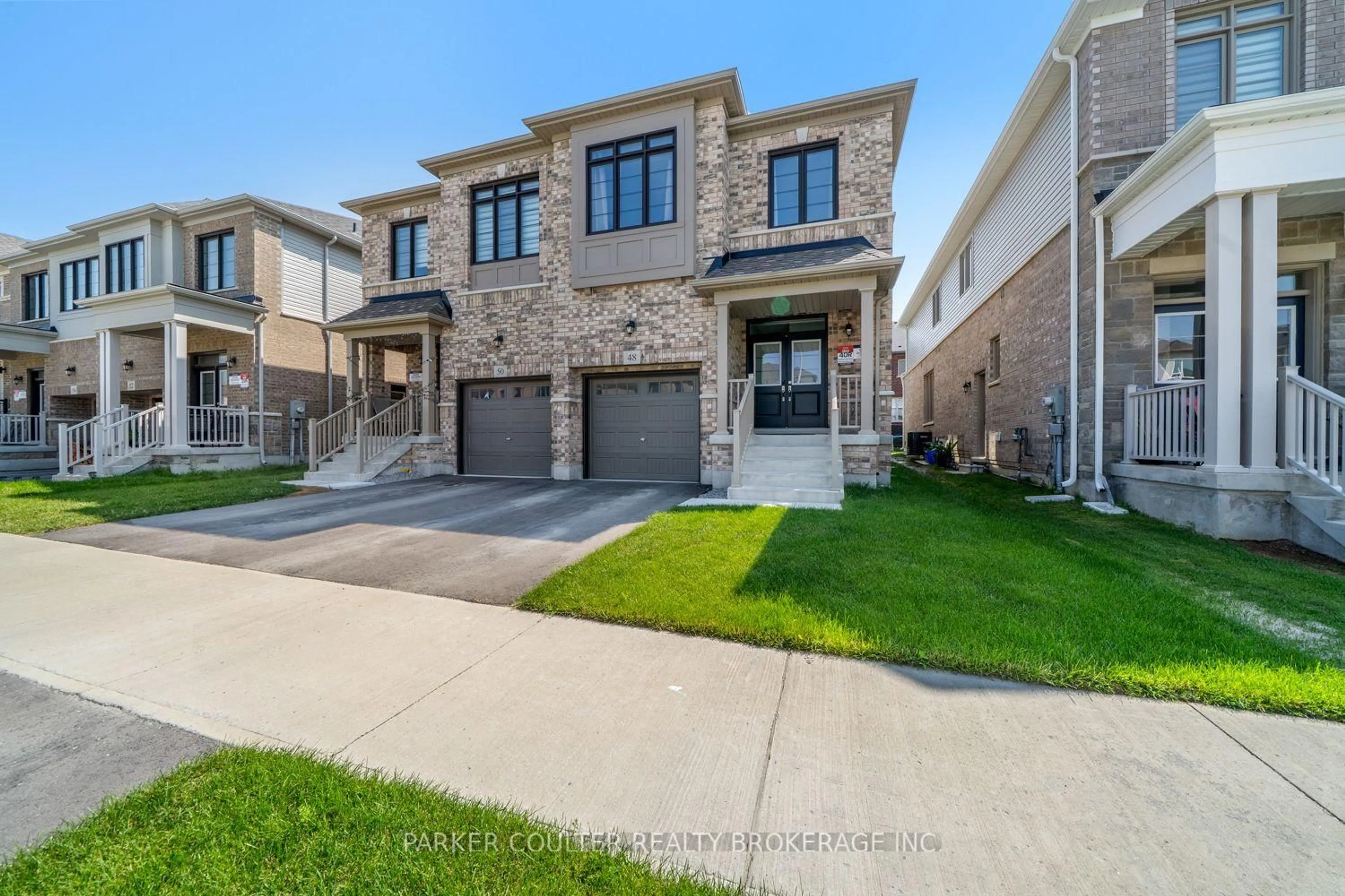 Home with brick exterior material, street for 48 West Oak Tr, Barrie Ontario L9S 2Z4