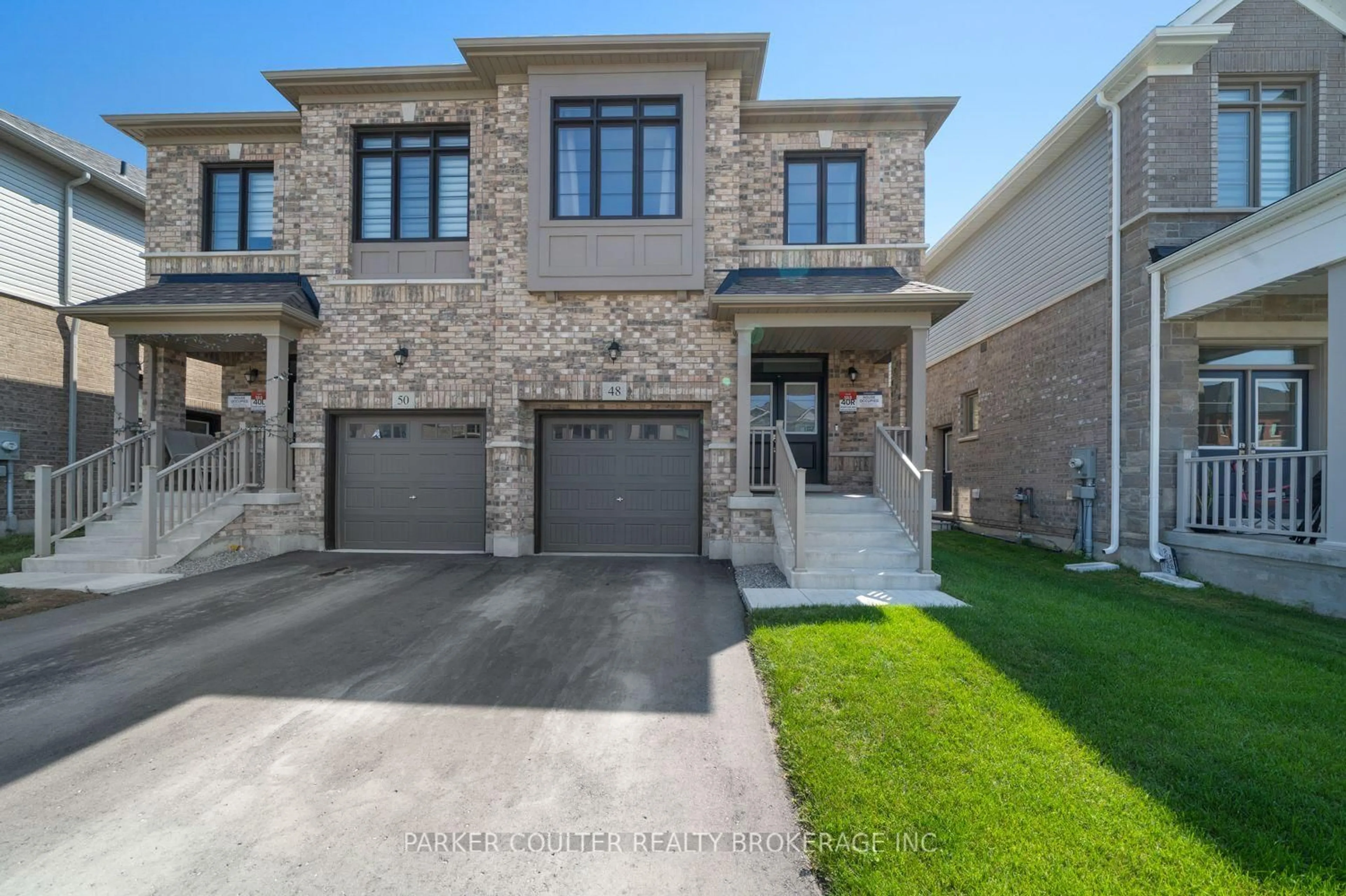 Home with brick exterior material, street for 48 West Oak Tr, Barrie Ontario L9S 2Z4