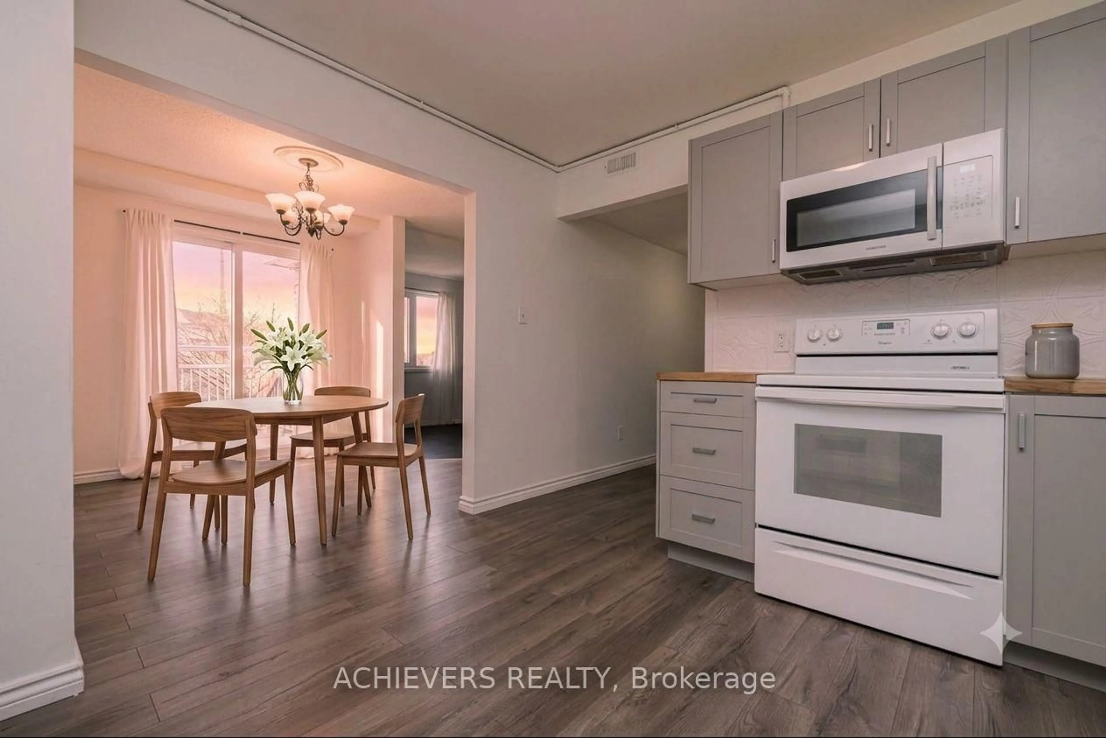 Open concept kitchen, wood/laminate floor for 510 Essa Rd #44, Barrie Ontario L4N 7L5