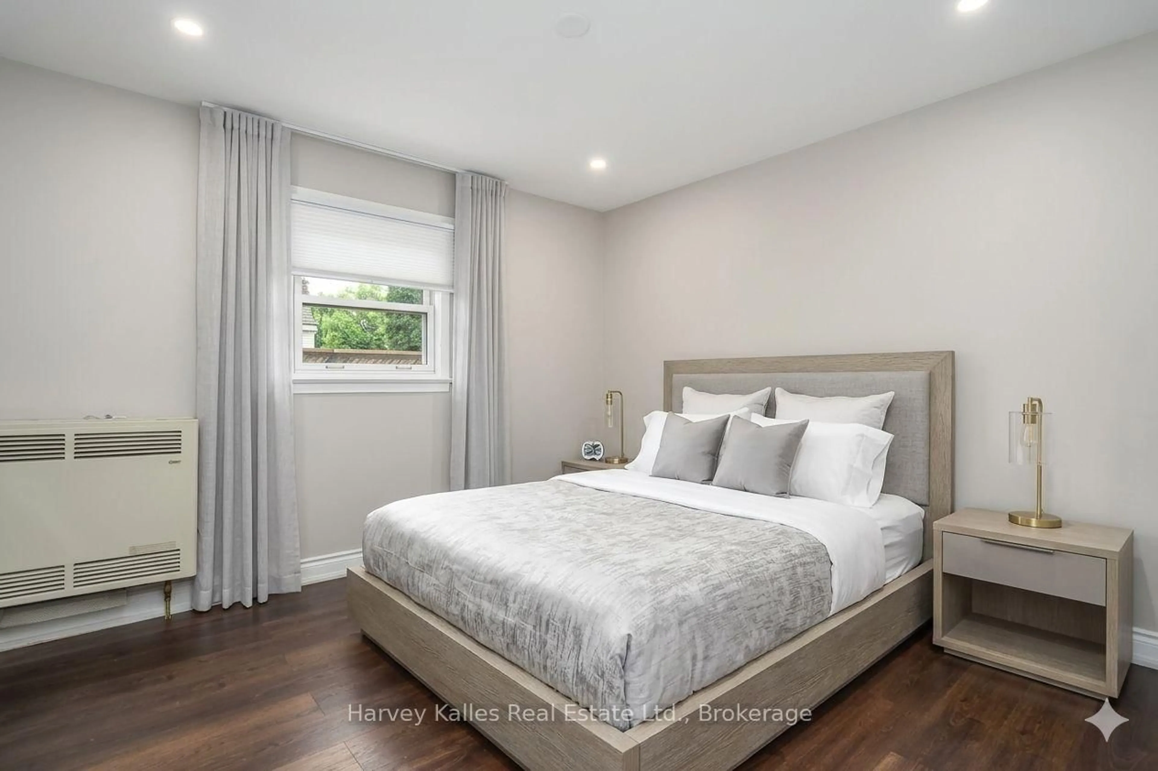 Bedroom with bed, wood/laminate floor for 27 Peel St, Penetanguishene Ontario L9M 1A5