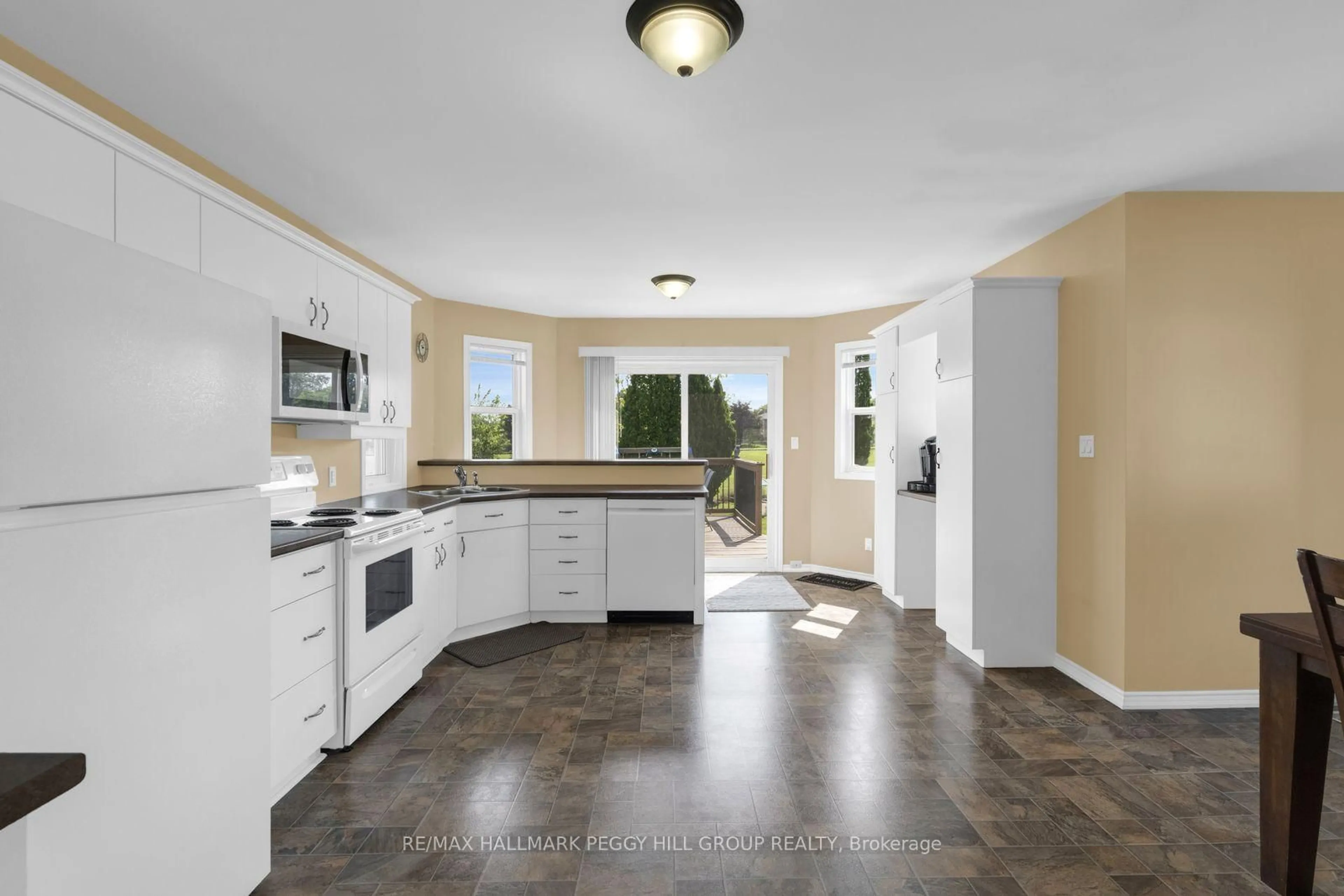 Open concept kitchen, ceramic/tile floor for 5 Allan Crt, Springwater Ontario L0L 1P0