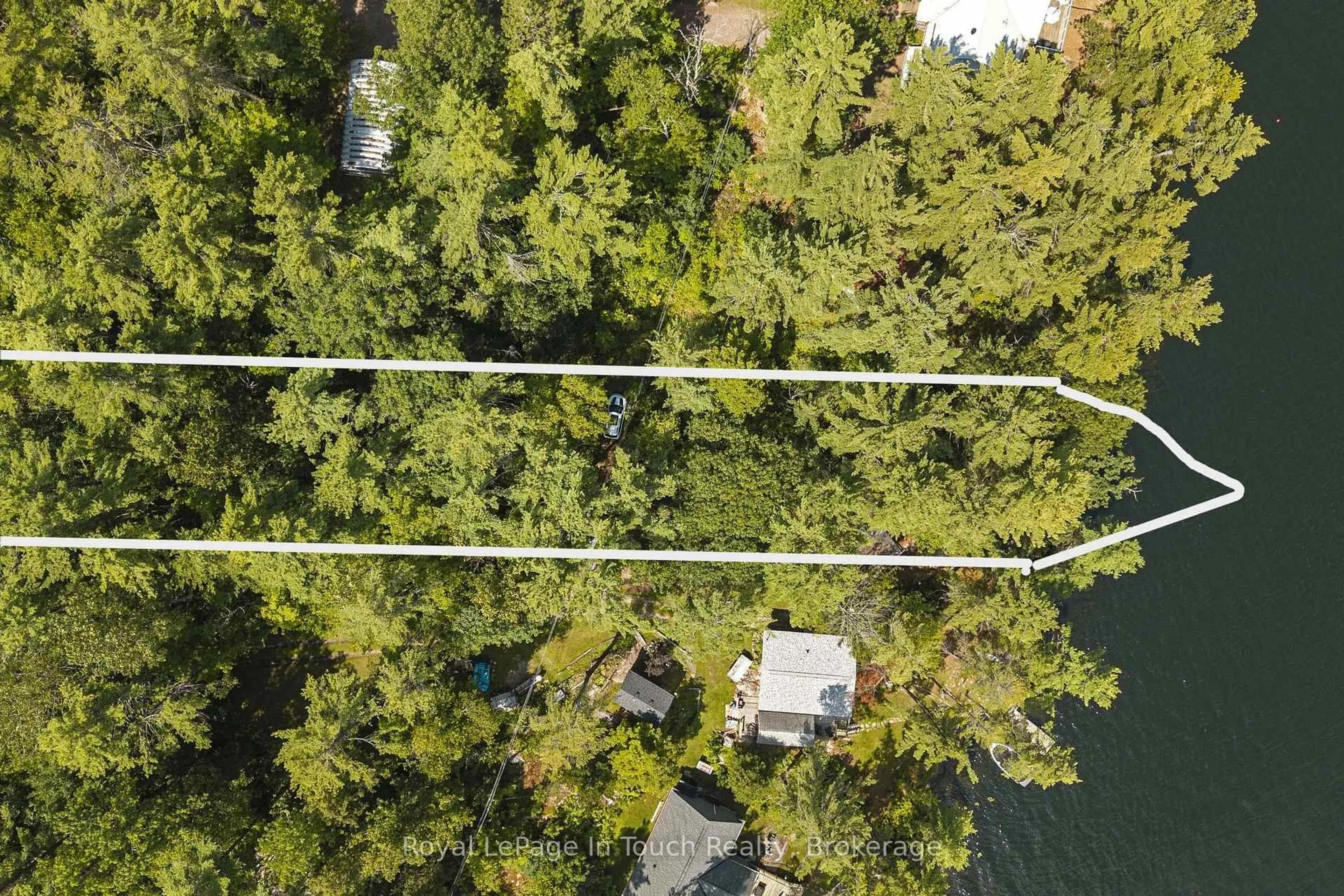 A pic from outside/outdoor area/front of a property/back of a property/a pic from drone, forest/trees view for 4163 Smith Lane, Severn Ontario L0K 1E0