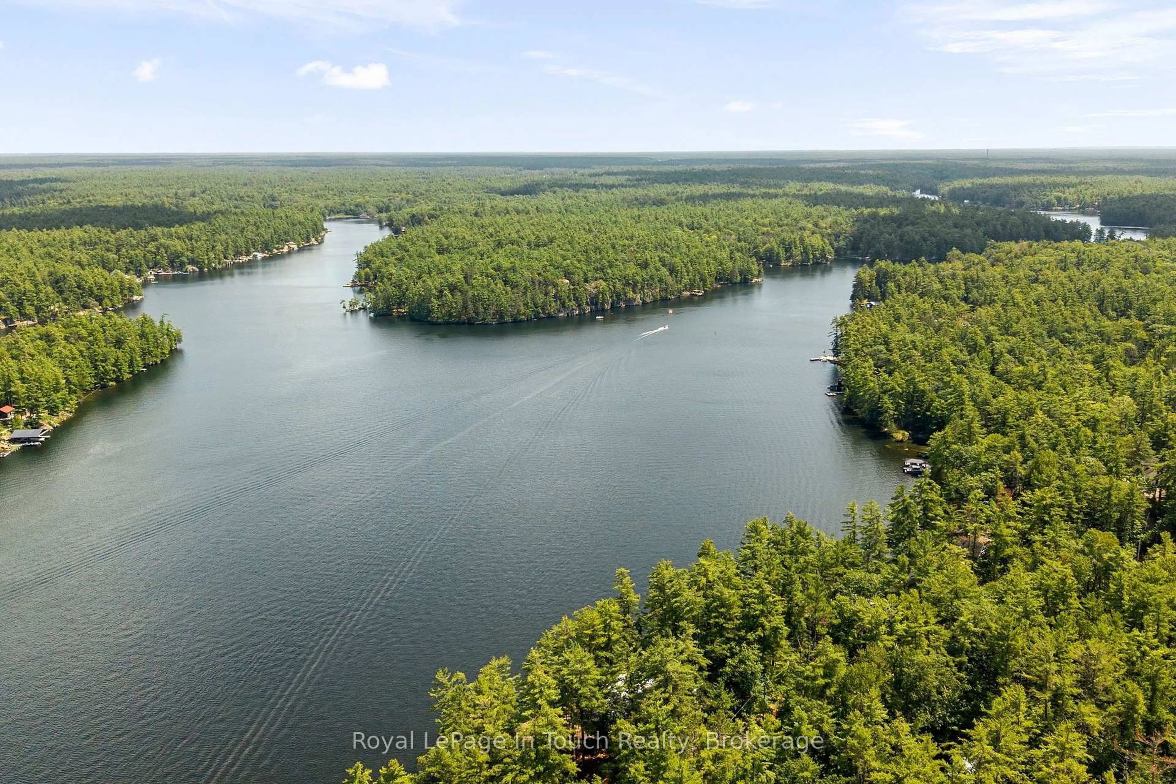 A pic from outside/outdoor area/front of a property/back of a property/a pic from drone, water/lake/river/ocean view for 4163 Smith Lane, Severn Ontario L0K 1E0