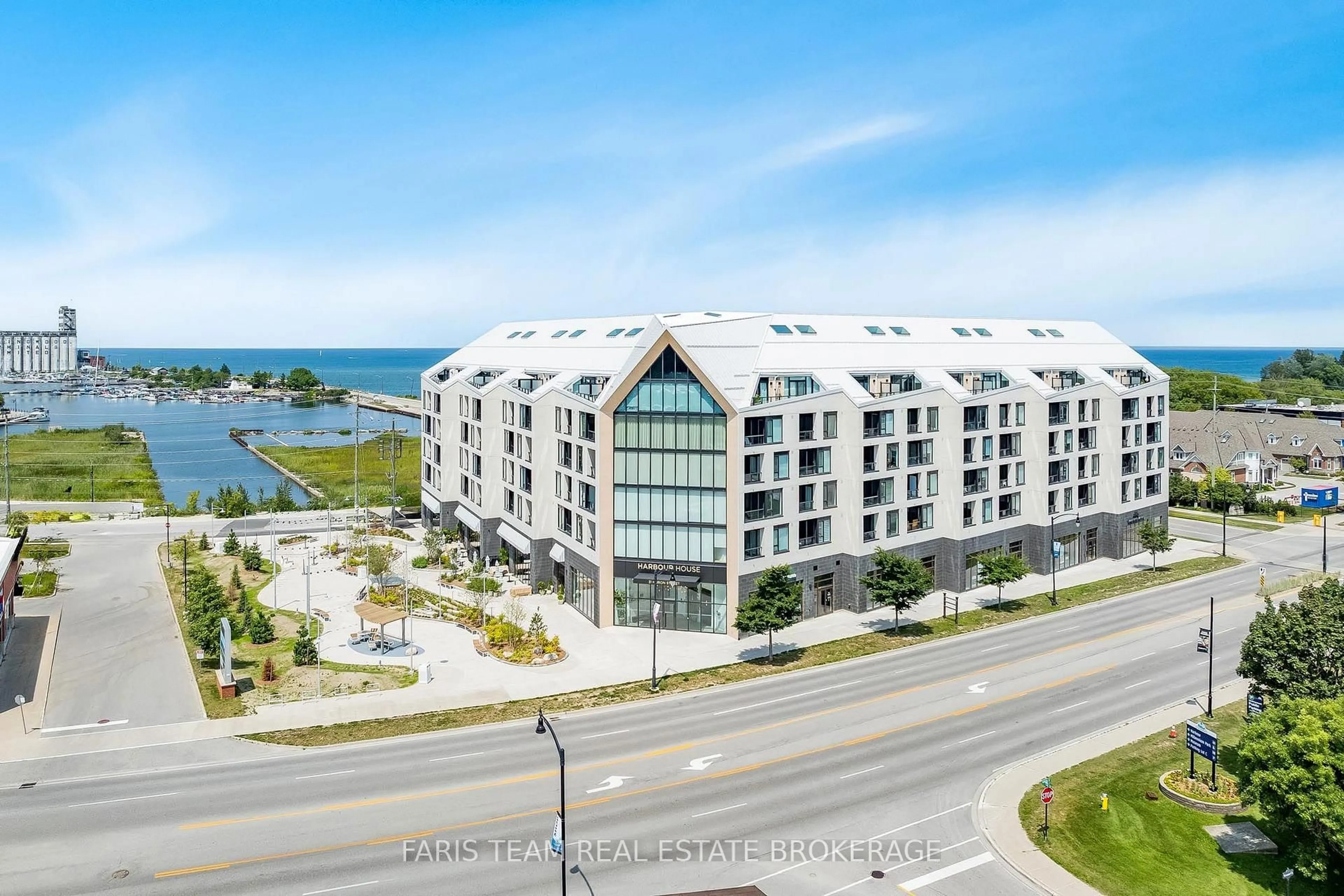 A pic from outside/outdoor area/front of a property/back of a property/a pic from drone, water/lake/river/ocean view for 31 Huron St #417, Collingwood Ontario L9Y 1C3