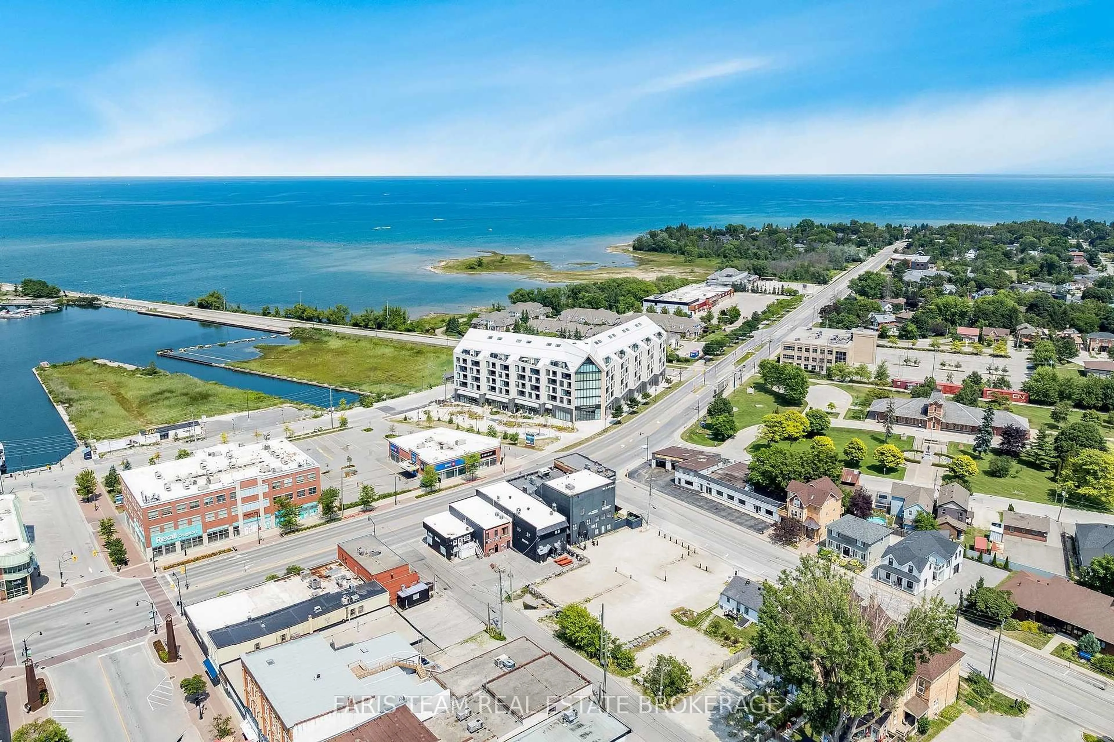 A pic from outside/outdoor area/front of a property/back of a property/a pic from drone, water/lake/river/ocean view for 31 Huron St #417, Collingwood Ontario L9Y 1C3