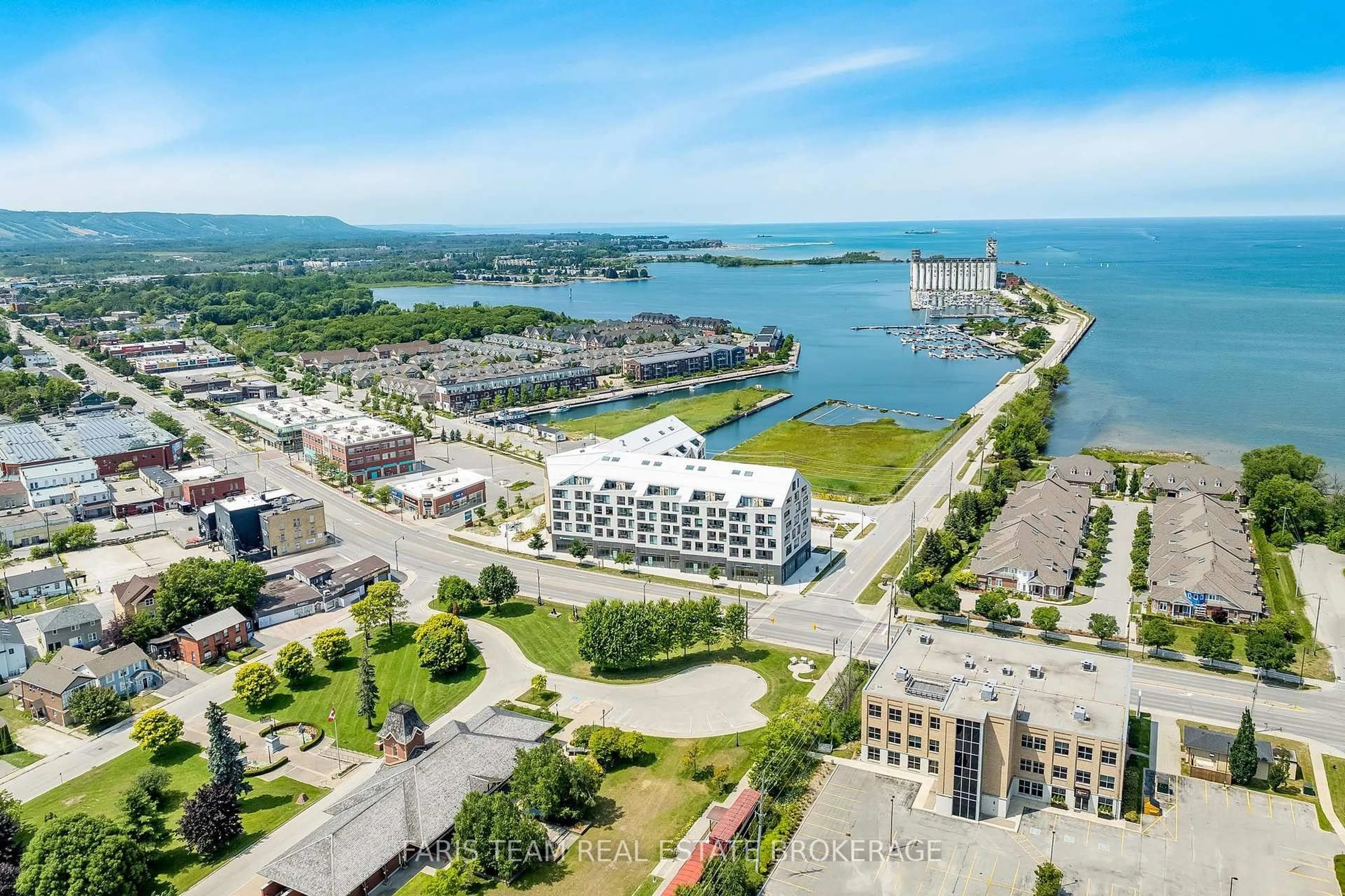 A pic from outside/outdoor area/front of a property/back of a property/a pic from drone, water/lake/river/ocean view for 31 Huron St #417, Collingwood Ontario L9Y 1C3
