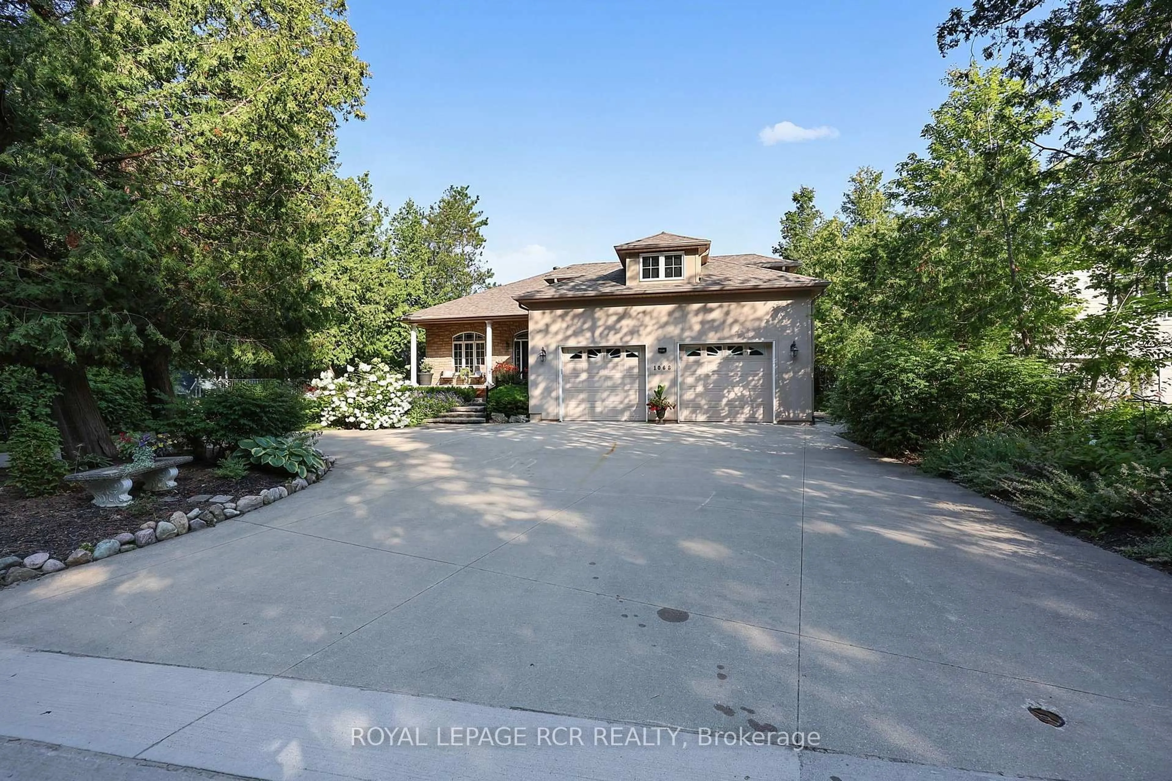 A pic from outside/outdoor area/front of a property/back of a property/a pic from drone, street for 1068 Shore Lane, Wasaga Beach Ontario L9Z 2A1