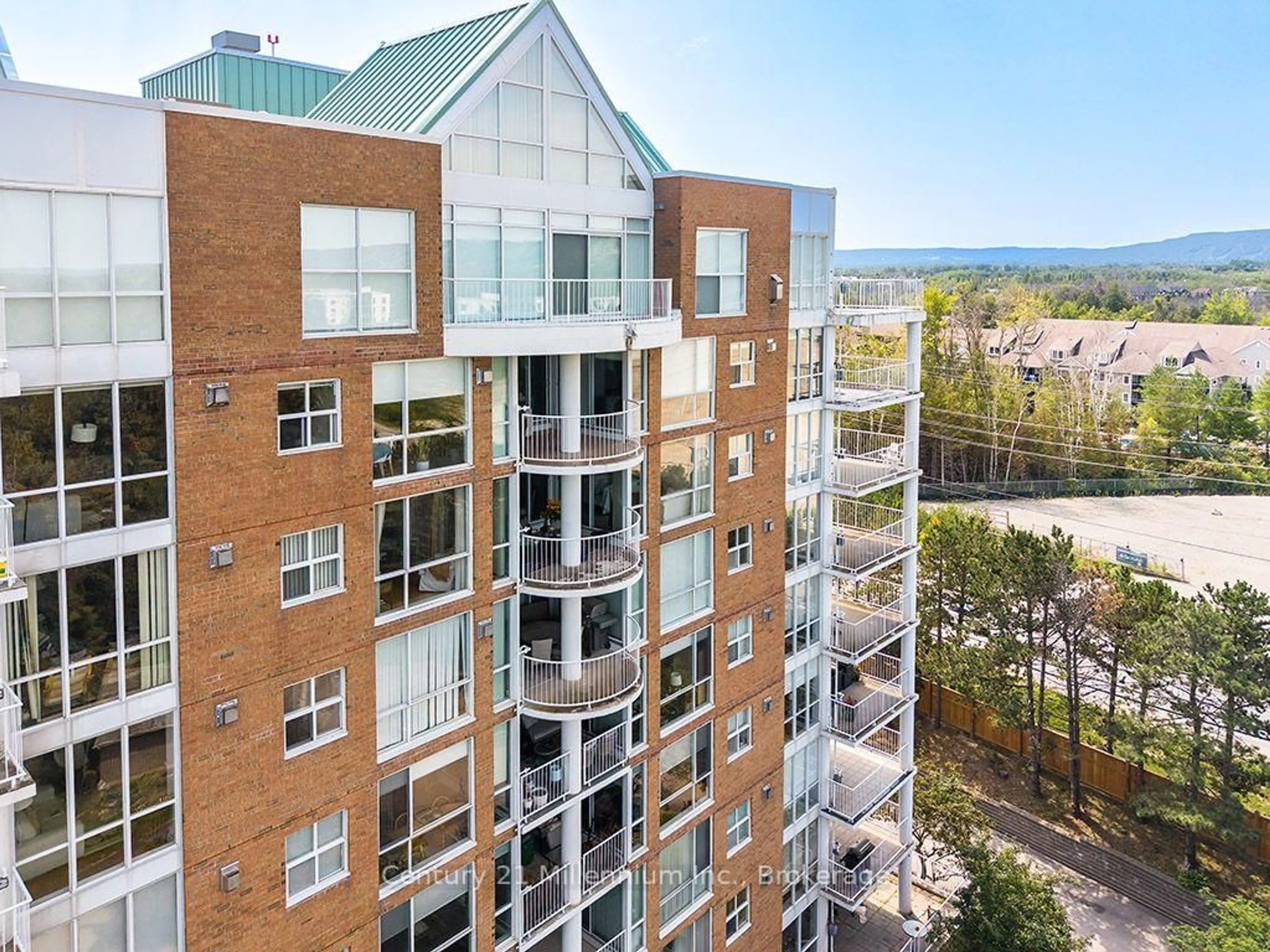 A pic from outside/outdoor area/front of a property/back of a property/a pic from drone, city buildings view from balcony for 24 Ramblings Way #802, Collingwood Ontario L9Y 5C6