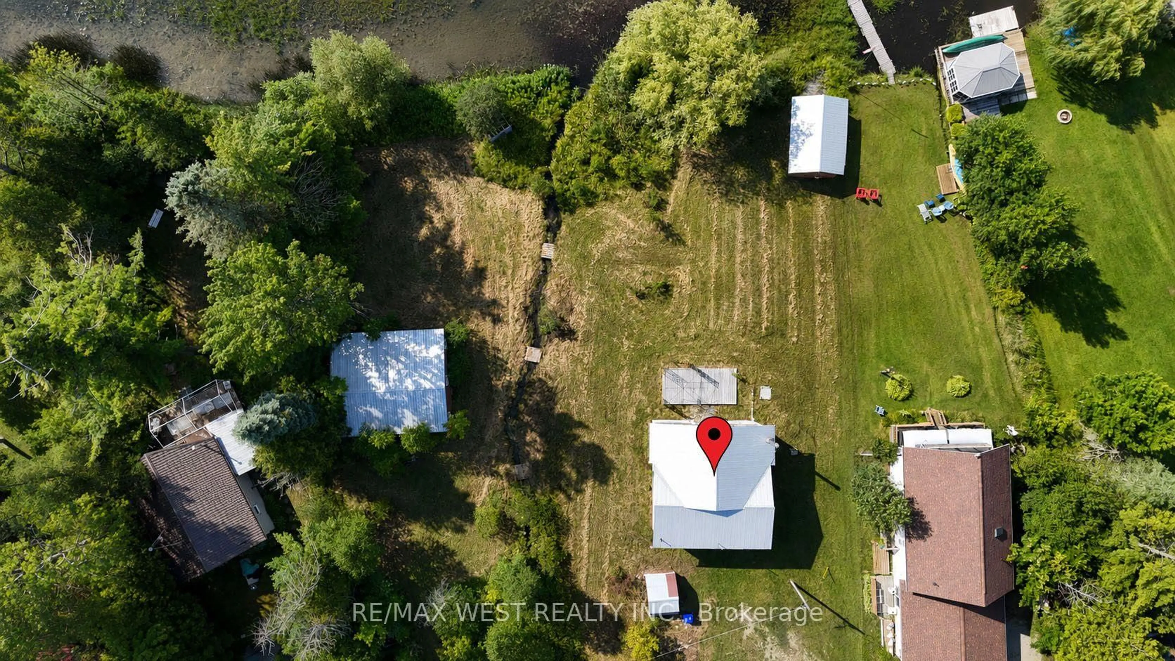 A pic from outside/outdoor area/front of a property/back of a property/a pic from drone, street for 2137 North Orr Lake Rd, Springwater Ontario L0L 1P0